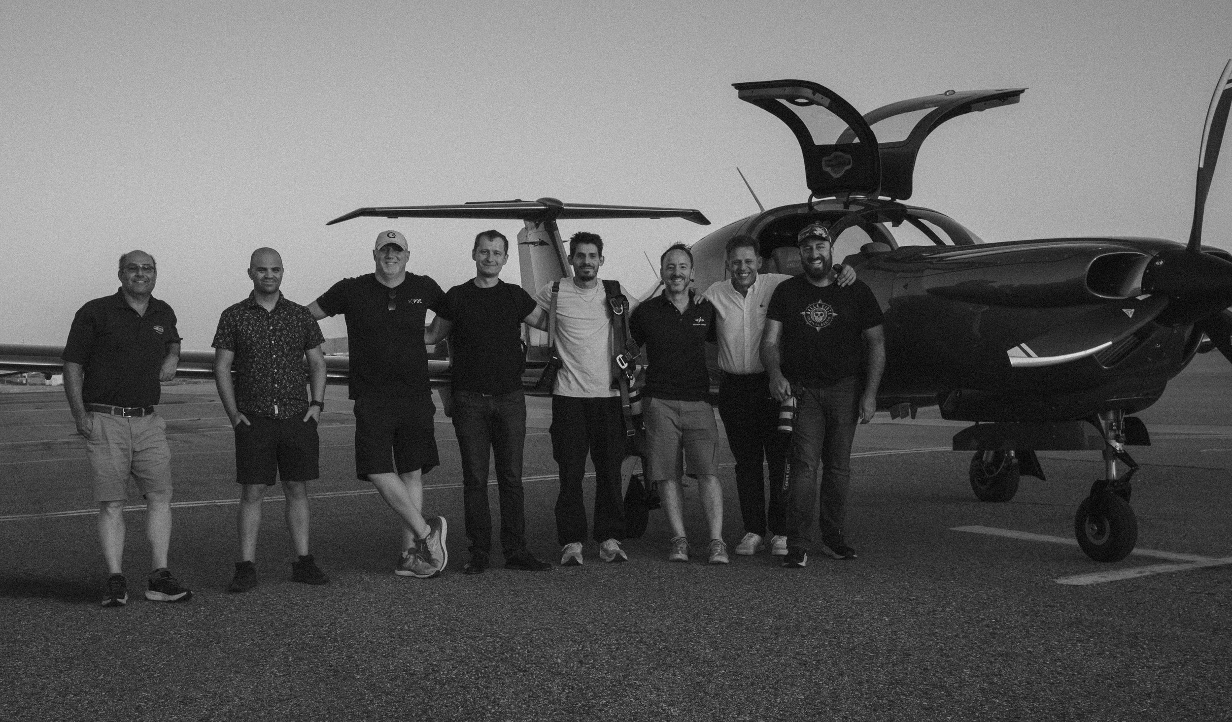 From left to right: Greg (formation pilot), Nicholas (lead formation), Jamie (formation pilot), Pepito (safety pilot), Leon (photographer), Mark (safety pilot), Gus (safety pilot), Chet (photographer).