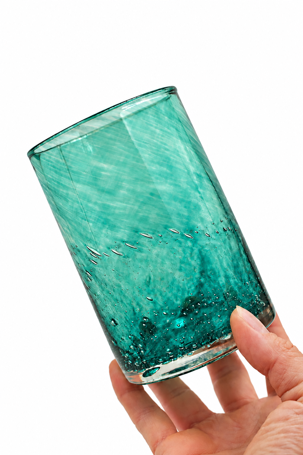 Teal Swirled Glass Tumbler in Hand.png