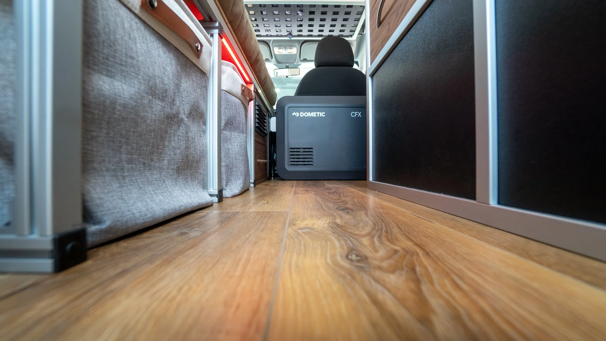 Full length unobstructed hallway, wider than some full sized vans, allows for easier mobility inside the van.