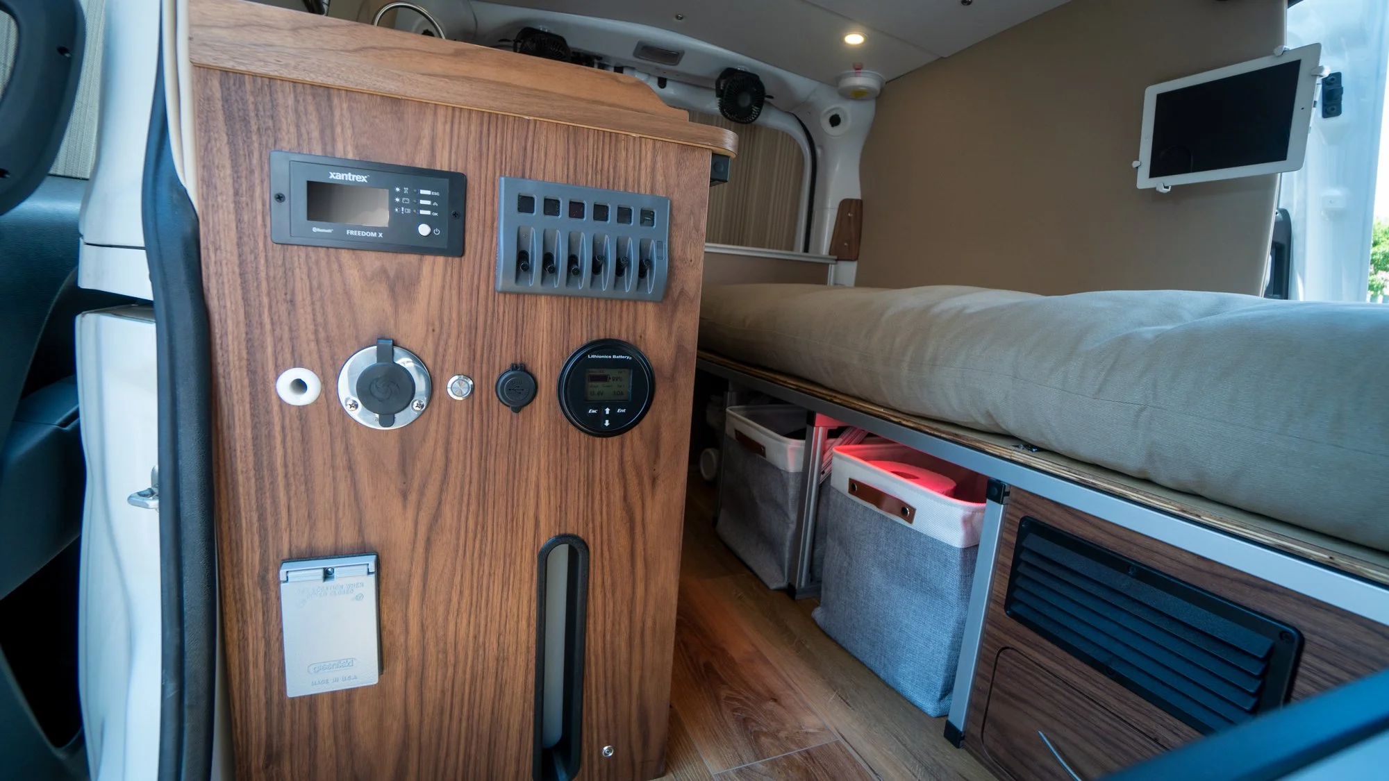 Central Command is where the van's heartbeat is monitored and controlled. Here you can also check the level and fill your 14 gallon fresh water tank. A weather protected 120VAC outlet is conveniently positioned for indoor/outdoor use.