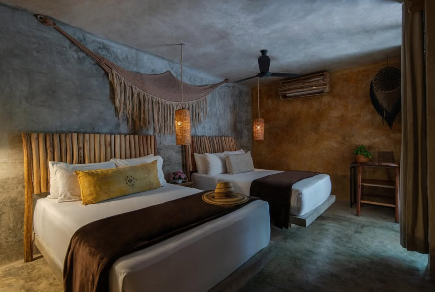 Shared room with two double beds and jungle view