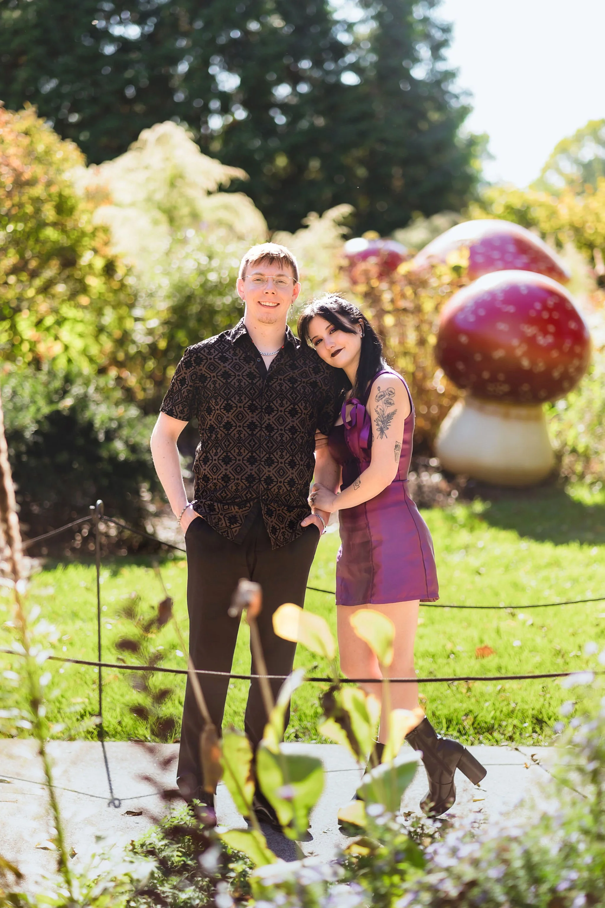 A couple poses for a picture in the outdoor art gallery in Indianapolis