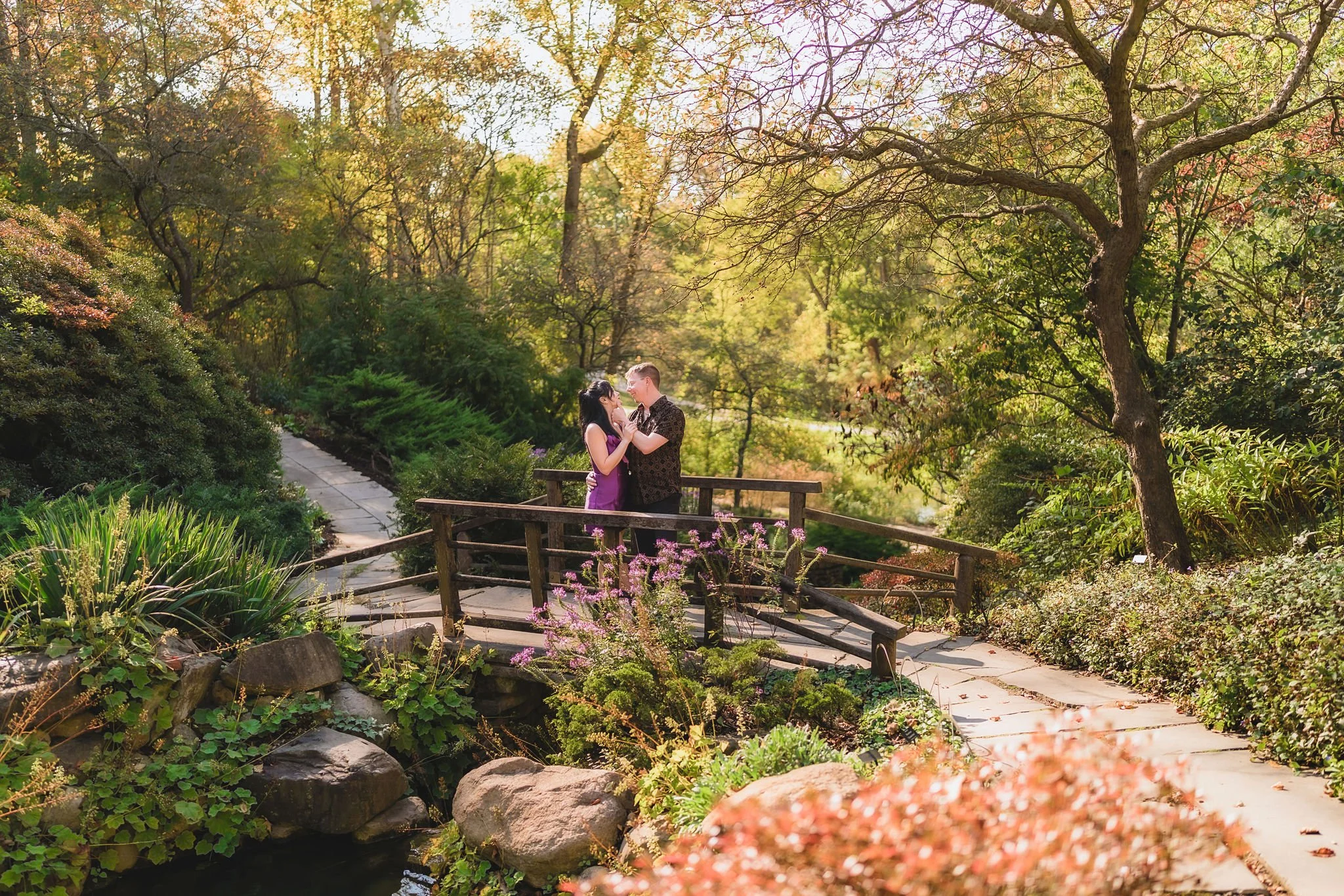 Engaged couple sharing a romantic moment during their Newfields engagement photography session in Indianapolis Indiana