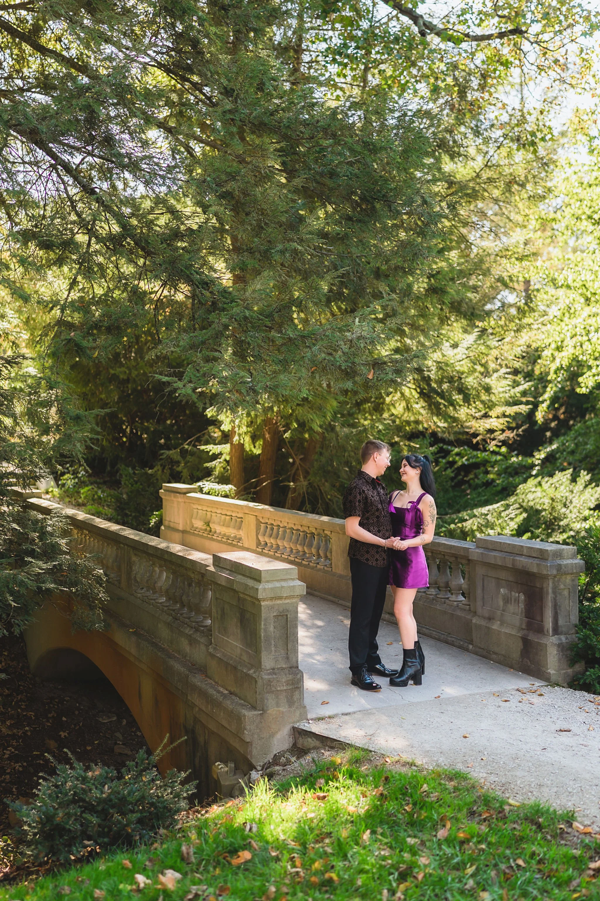 Candid engagement photography at Newfields in Indianapolis featuring a couple enjoying a quiet moment together outdoors