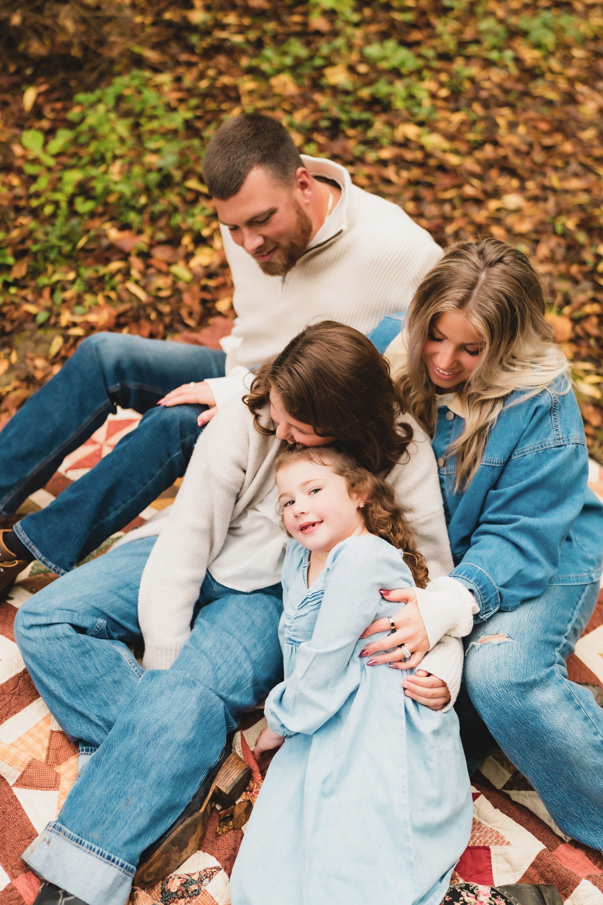 Parents and children making memories on their property before construction begins.