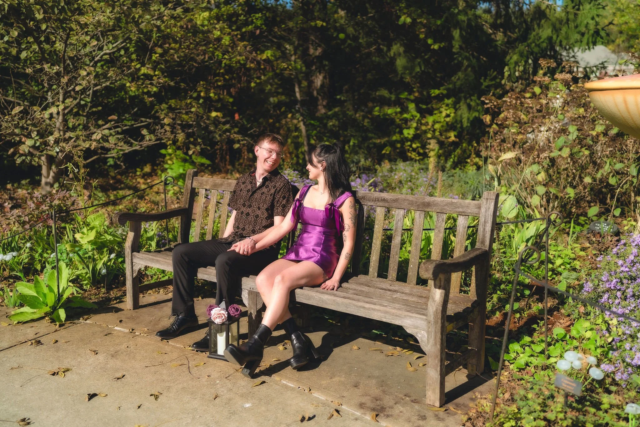 Newfields garden engagement session capturing genuine connection and romantic moments between a couple