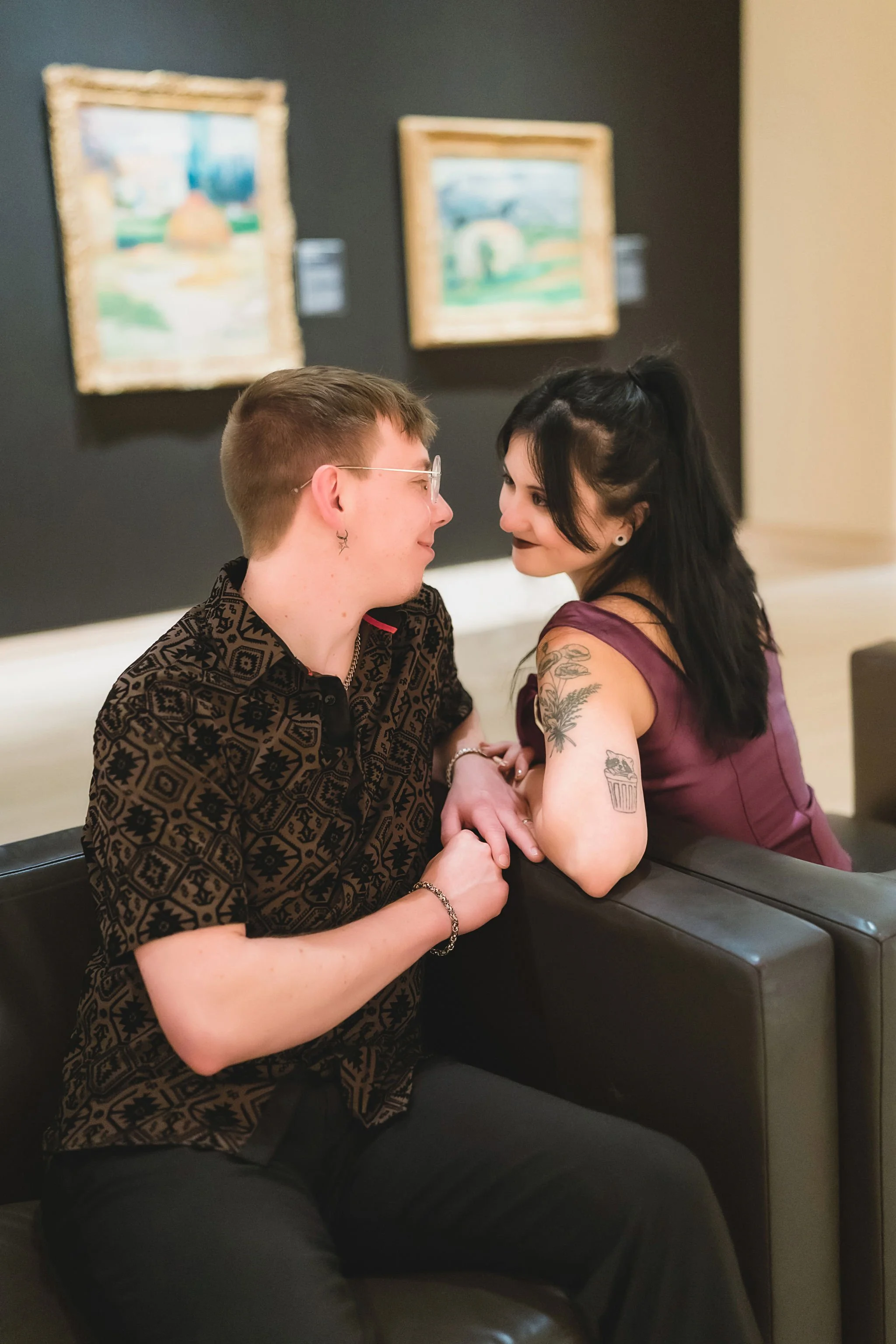 Engagement portraits of a couple inside the art galleries at Newfields in Indianapolis Indiana
