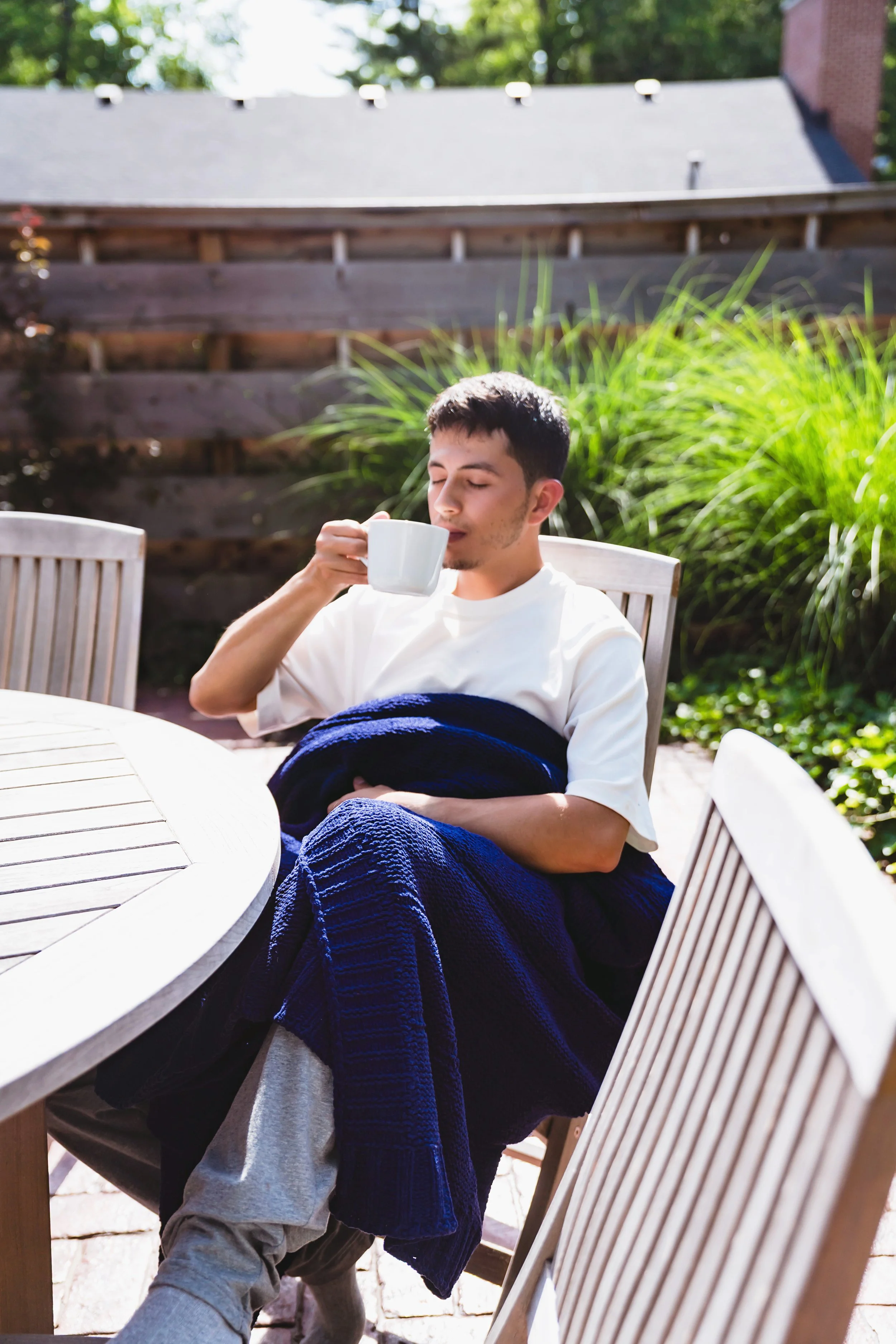 Cozy storytelling photography showing warmth and comfort of luxury knit blankets