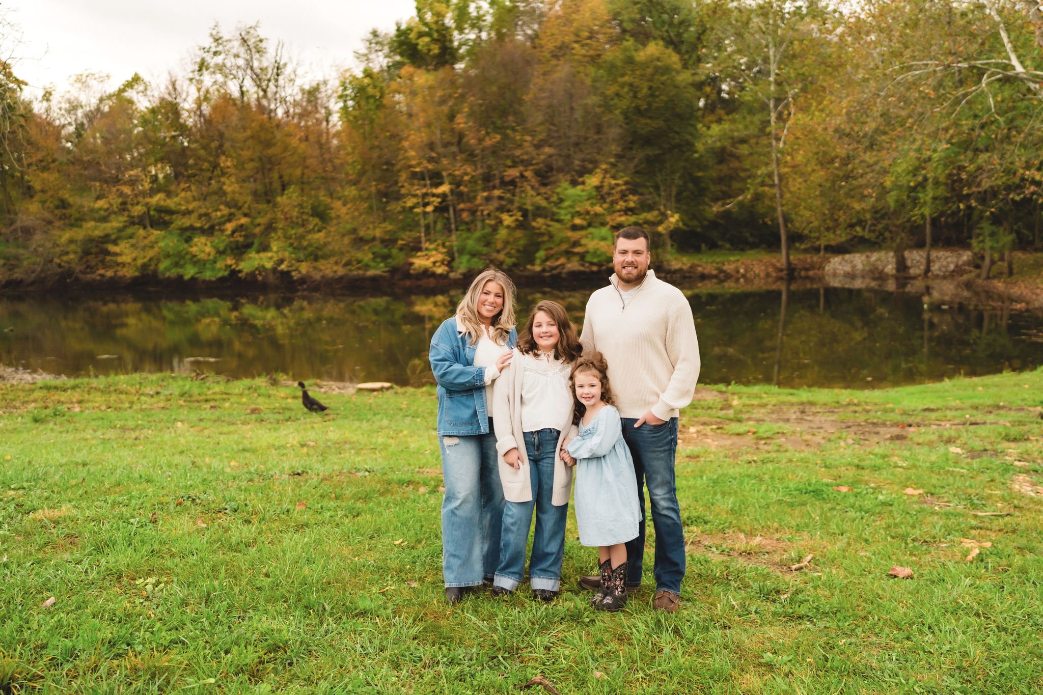 Indiana family photographer documenting a family on the land where their new home will be built.