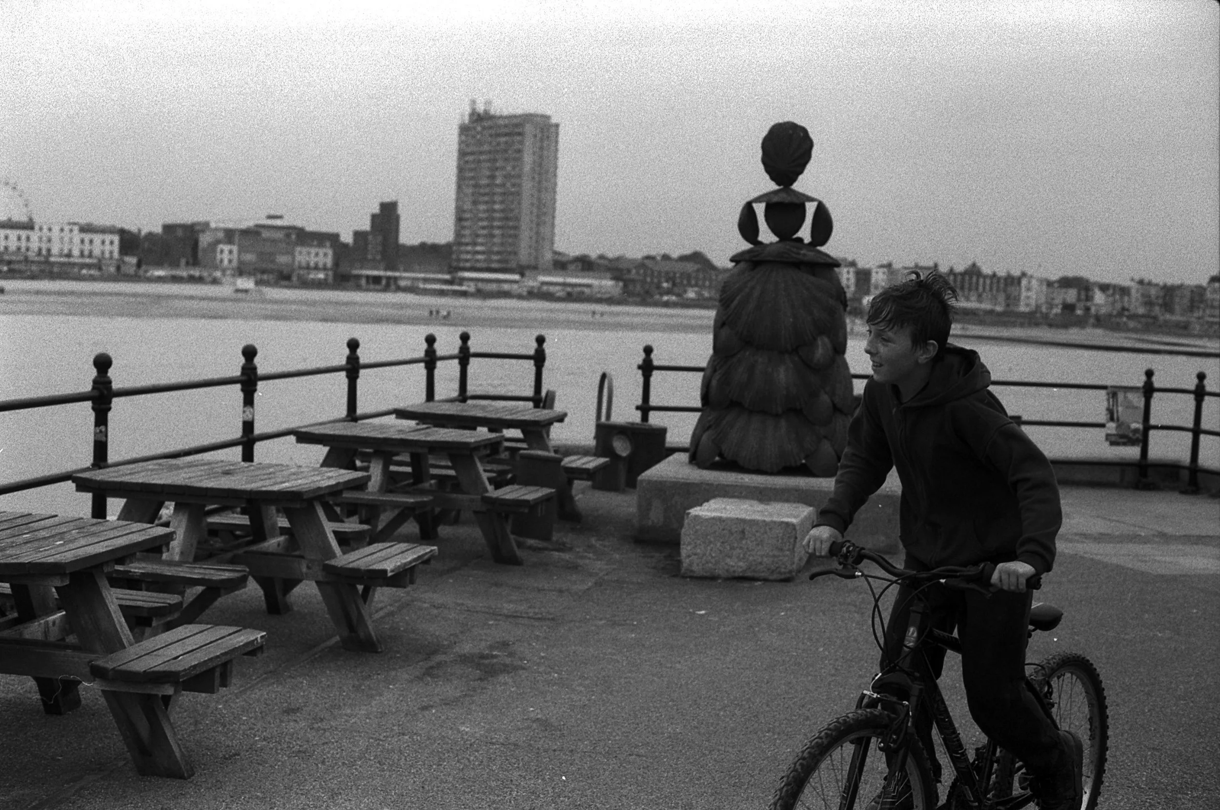 Arlington statue and boy on bike