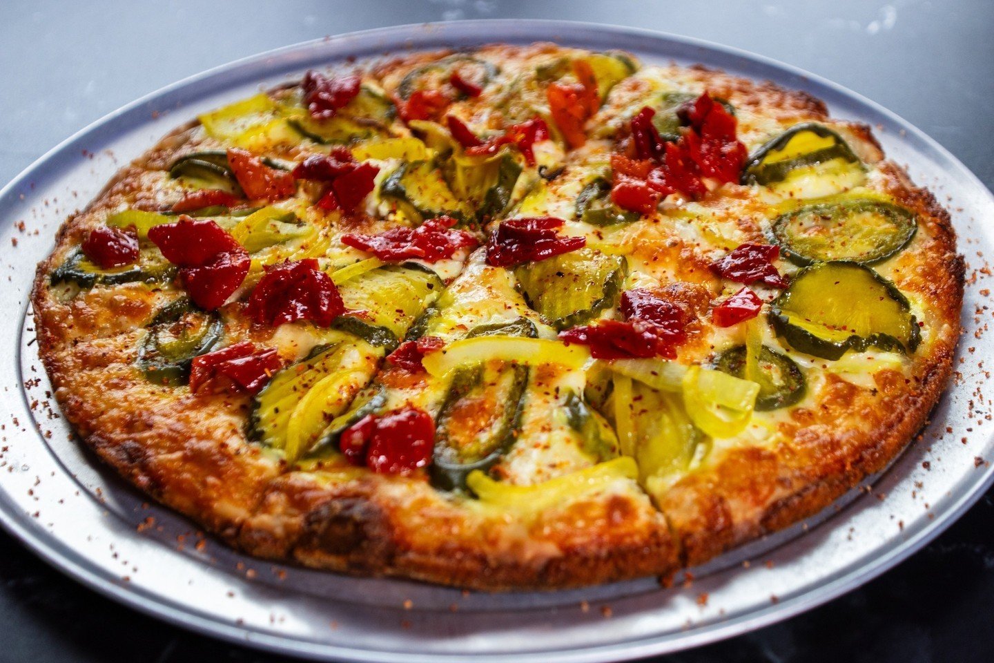 Our Pickle Pizza is kind of a big dill.⁠
⁠
Topped with house made B&amp;B pickles, pickled jalapeno and onions, Mama Lil's Peppers and Tajin.⁠
⁠
#picklepizza #picklelovers #barpie #eastcoastfoodies