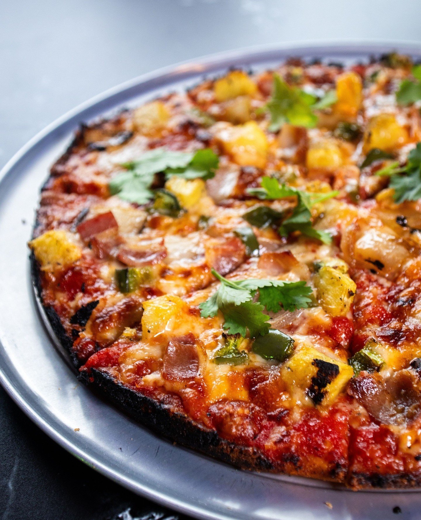 Our Pineapple, Bacon &amp; Jalapeno pizza: a sweet, savory, and spicy treat in the form of a bar pie.⁠
⁠
#pineappleonpizza #pineapplepizza #mainefoodie #nhfoodie #massfoodies