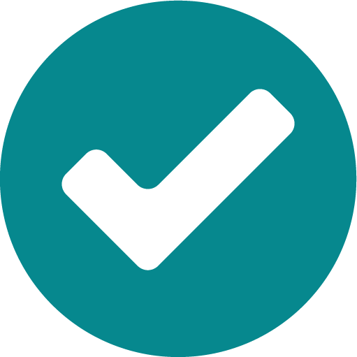 Scenic view of mountains and lake with grassy foreground, cloudy sky.