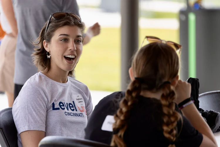 Group of students and coaches at monthly meetup
