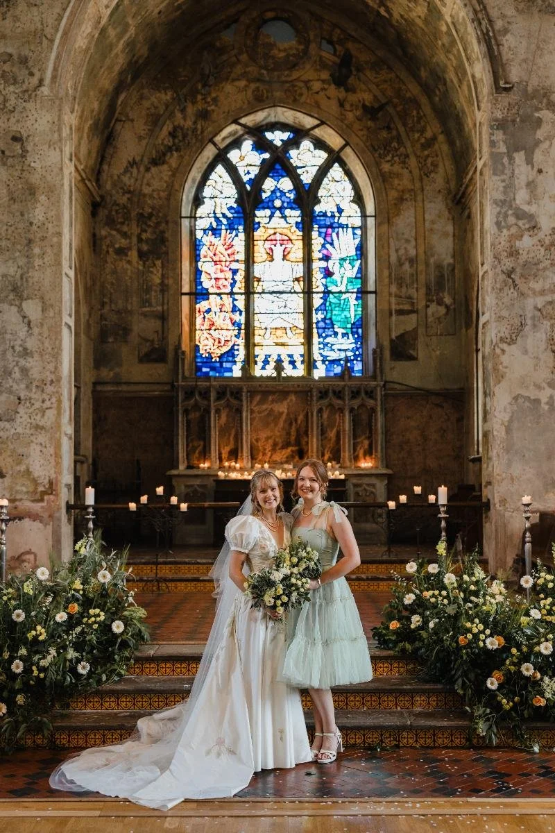 bride and Bridesmaid in mismatched pastel dresses in Bristol