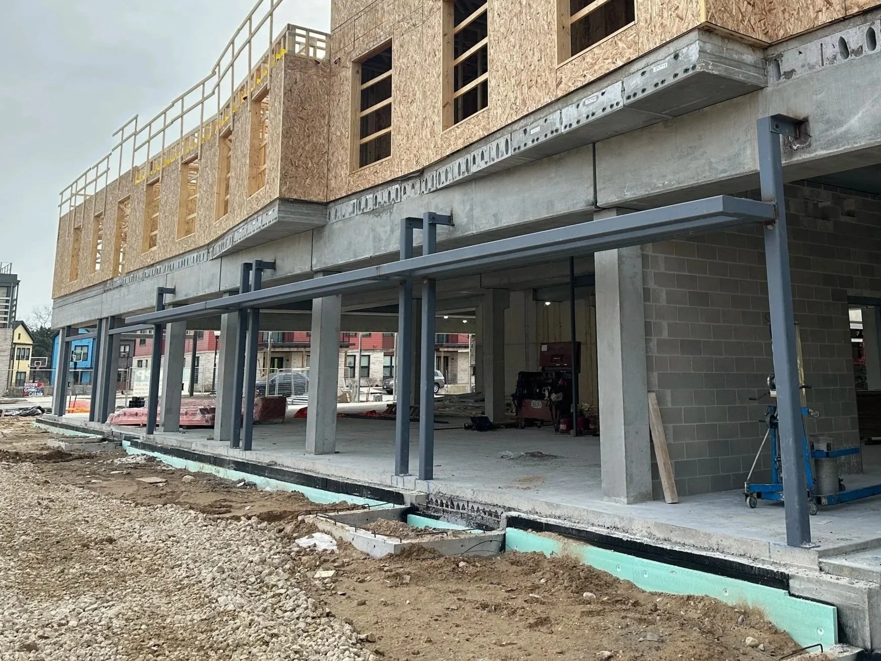 03.25.2026 - Metal canopies are installed over the future entrance to The Kaleidoscope.