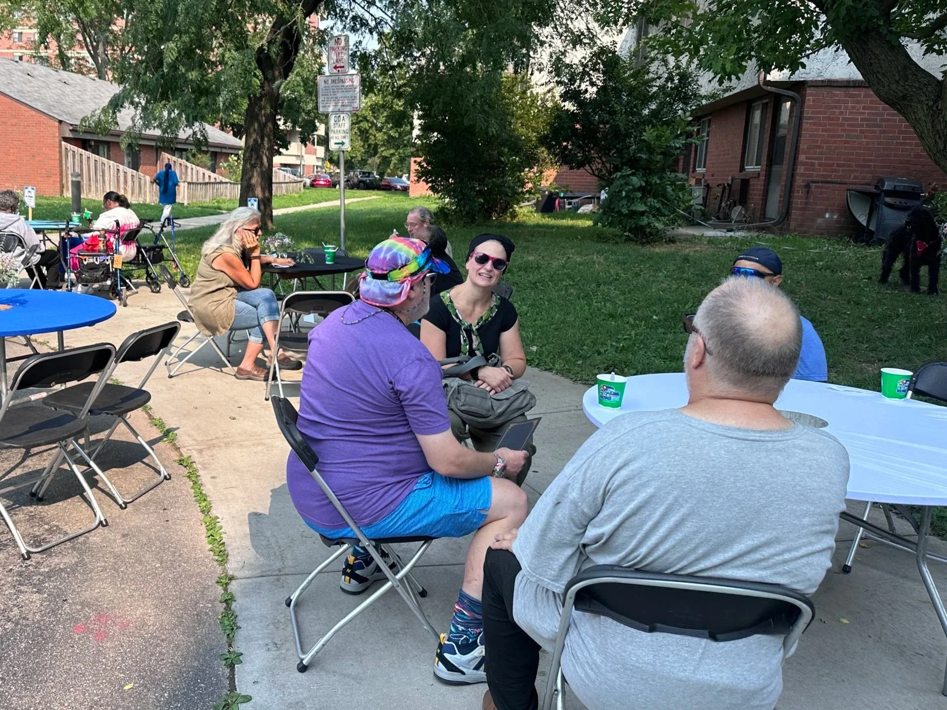 08.12.2026 - Artists selected to create the Luna entrance mosaic talk to residents at the CDA Social about their desired themes for the art piece.