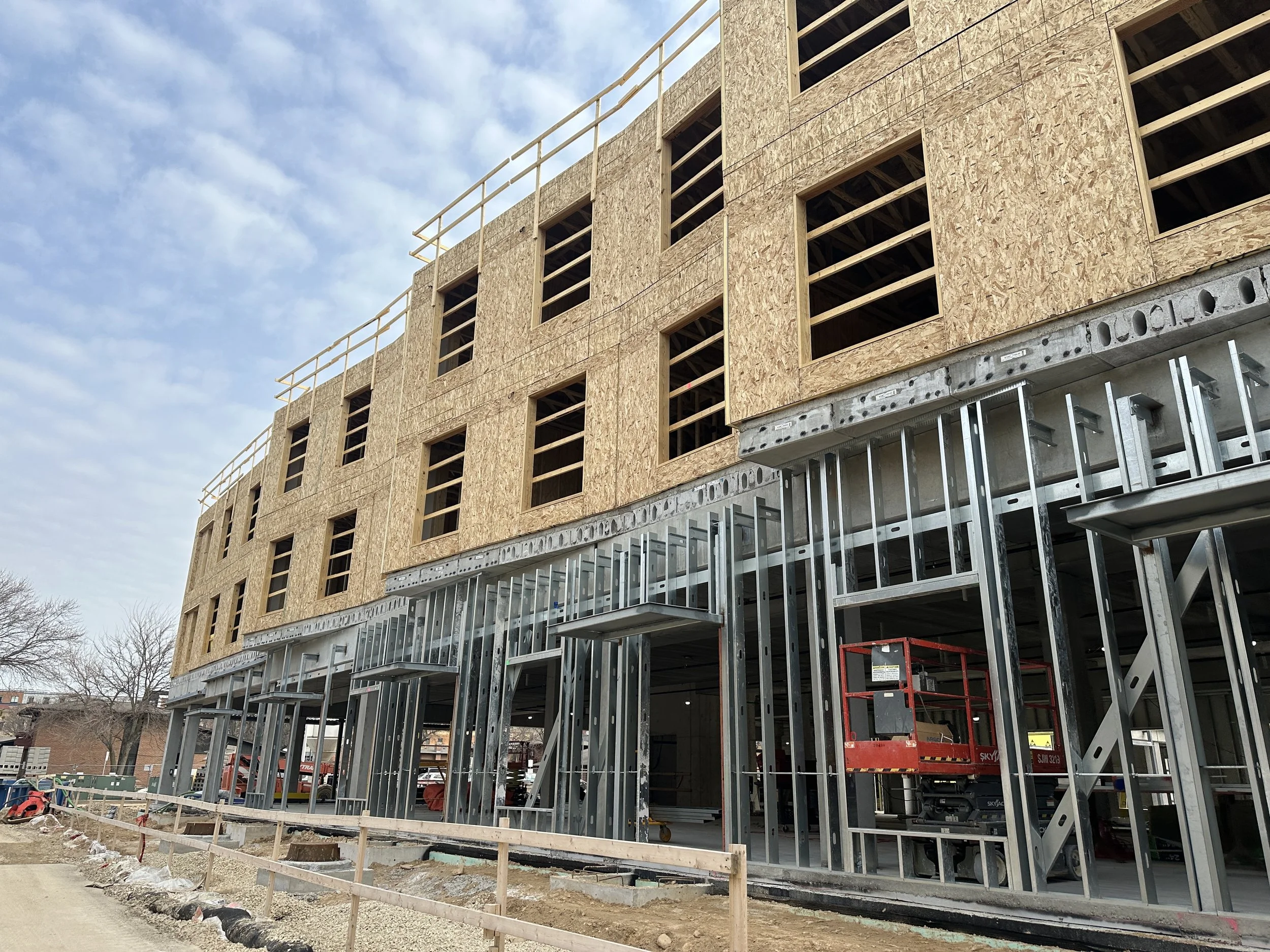 03.25.2026 - Patio canopies along first floor of Luna (B1.) These first floor units will look out onto the future multi-use path.