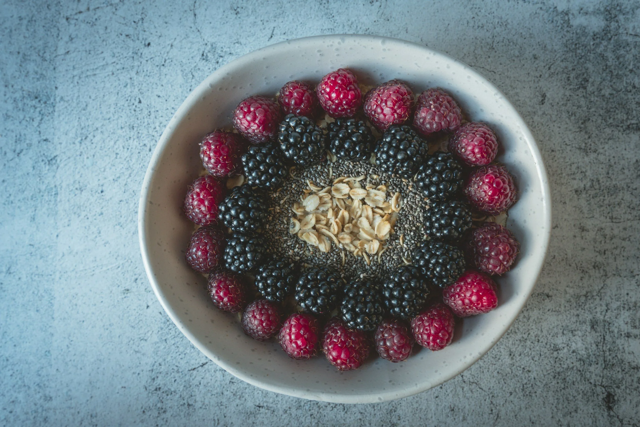 A plate of colorful fruits and vegetables.