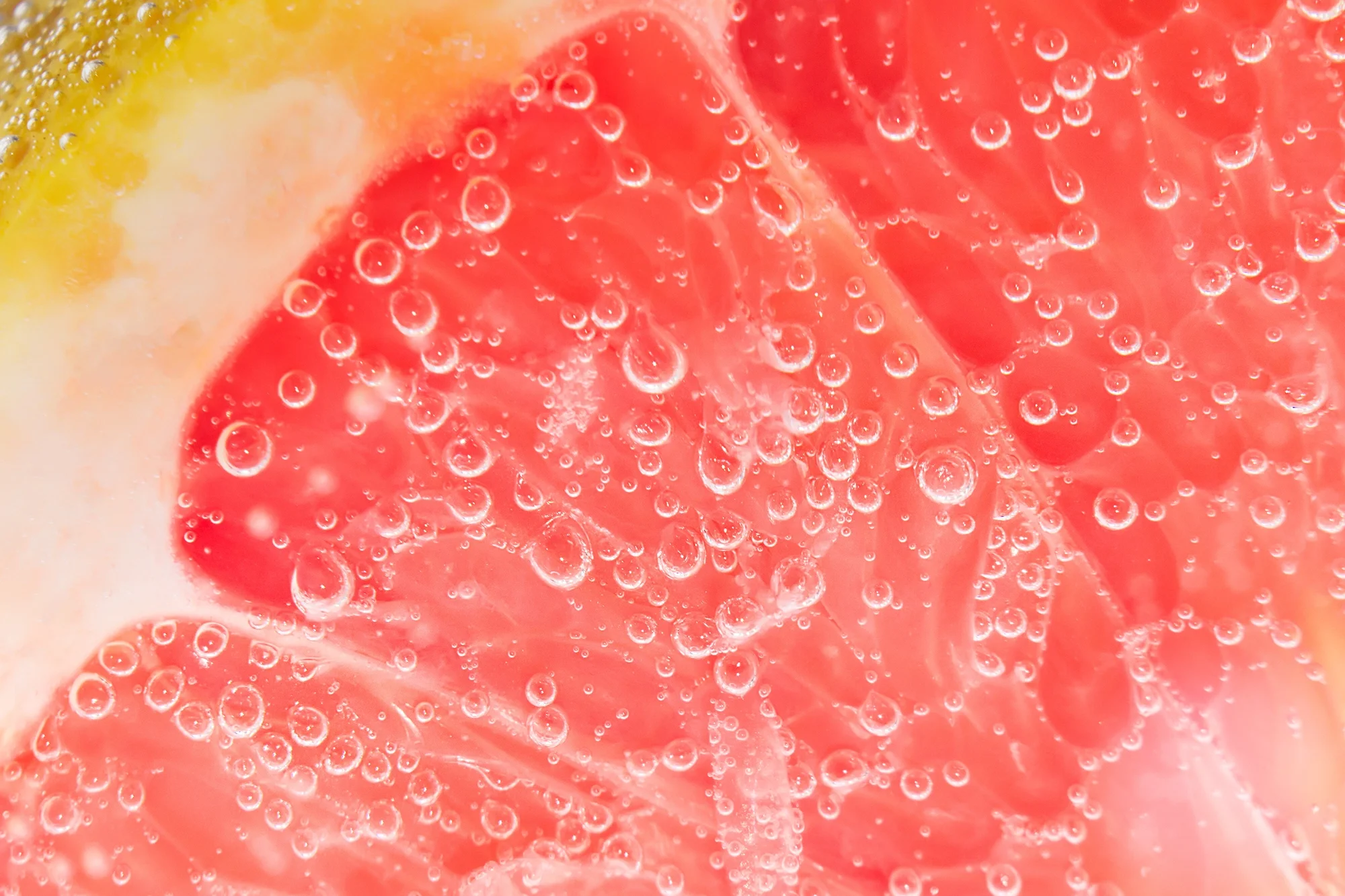Close up of a Grapefruit Slice with Bubbles