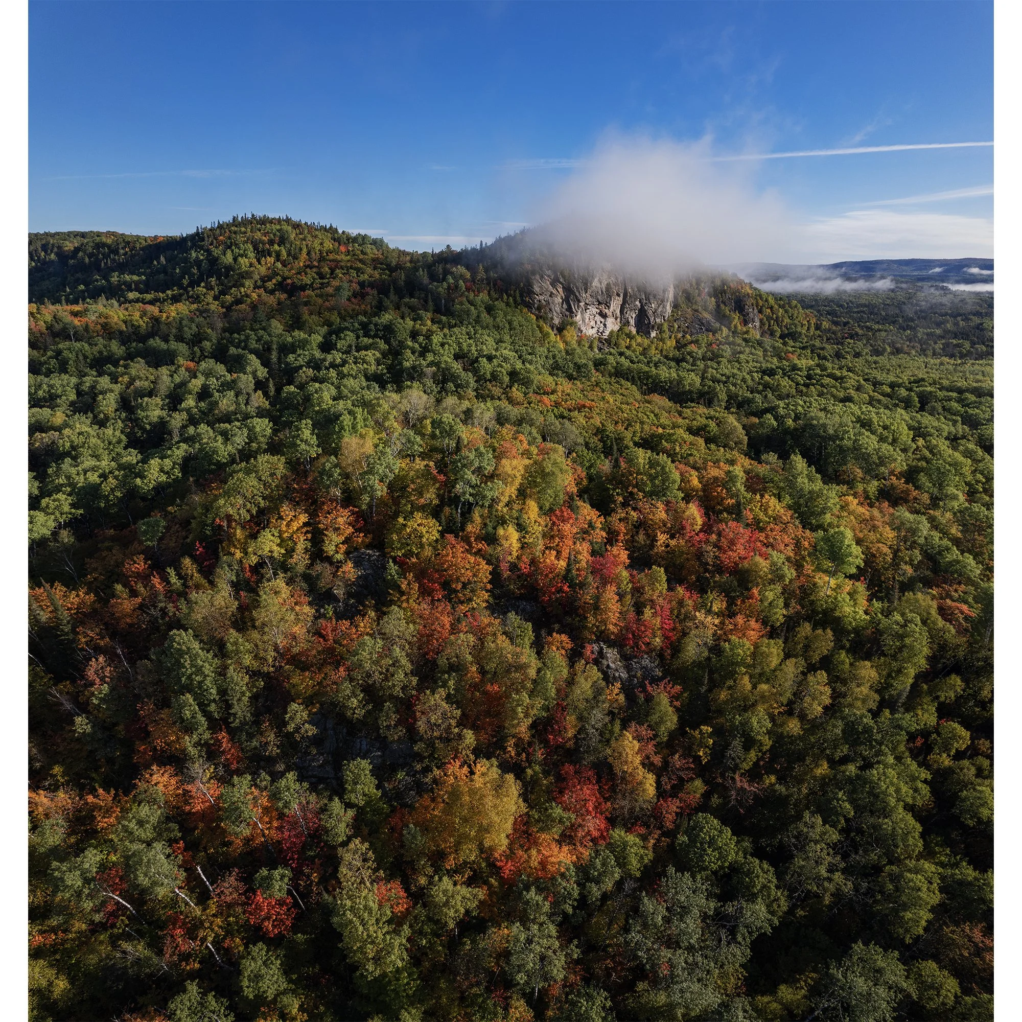 Isolated Cloud Over Cliff Near Searchmont