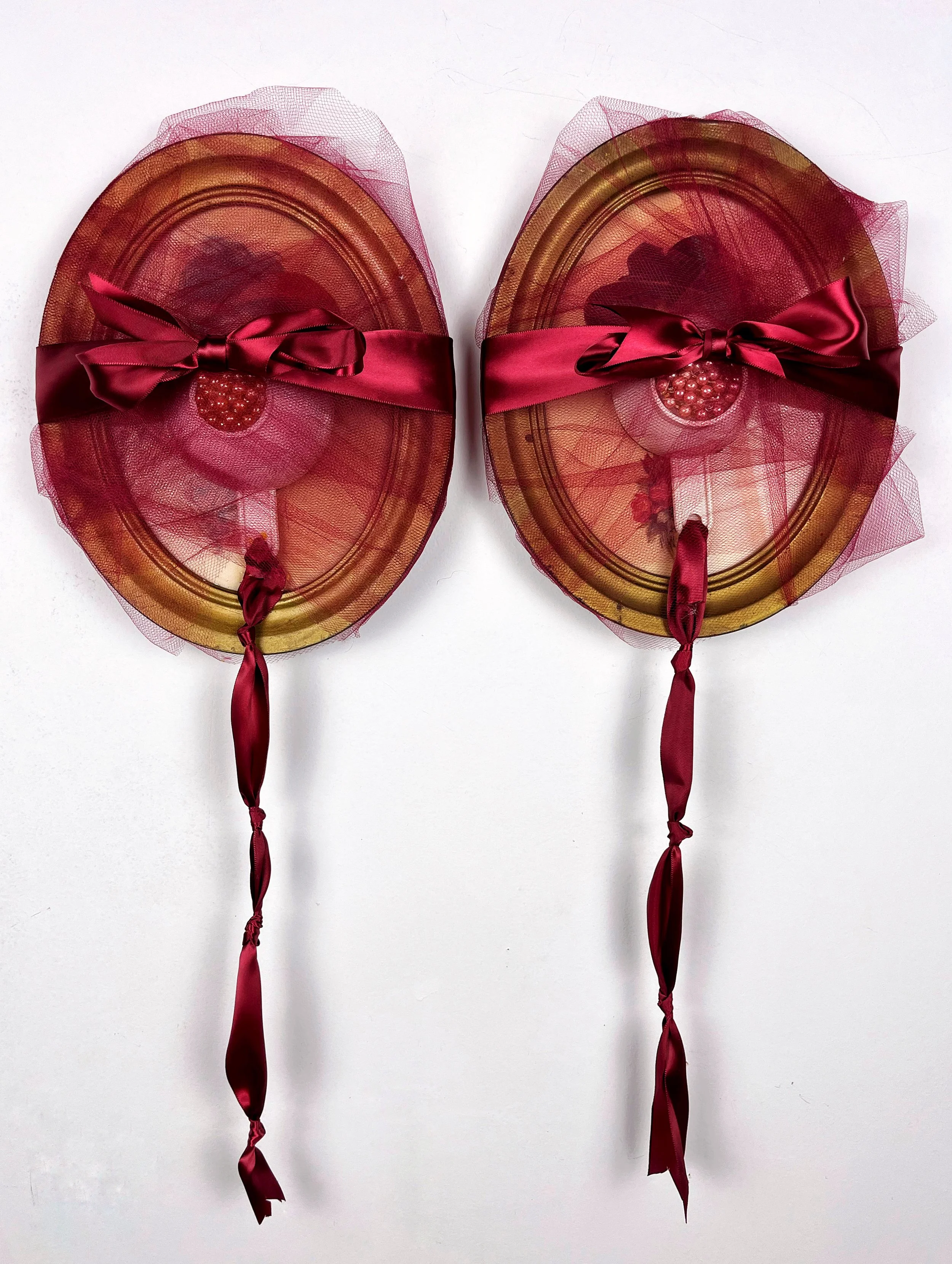 "PORTRAIT of TWO WOMEN", Vintage portraits of women, plastic measuring cups, pearls, satin ribbon, tulle. 30 X 30 X 6 inches
