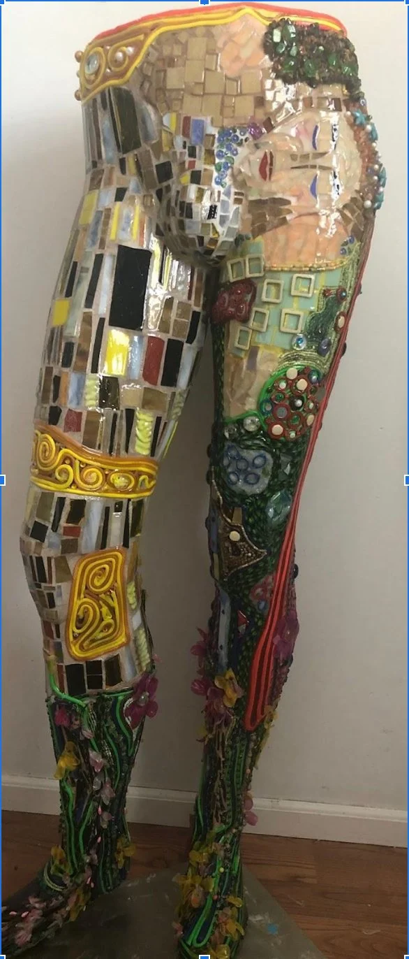 "Homage to Klimt's Kiss," Glass bits discarded by a lamp maker, grout, parachute cord, beads, recycled plastic flowers, 34" x 12" x 15"