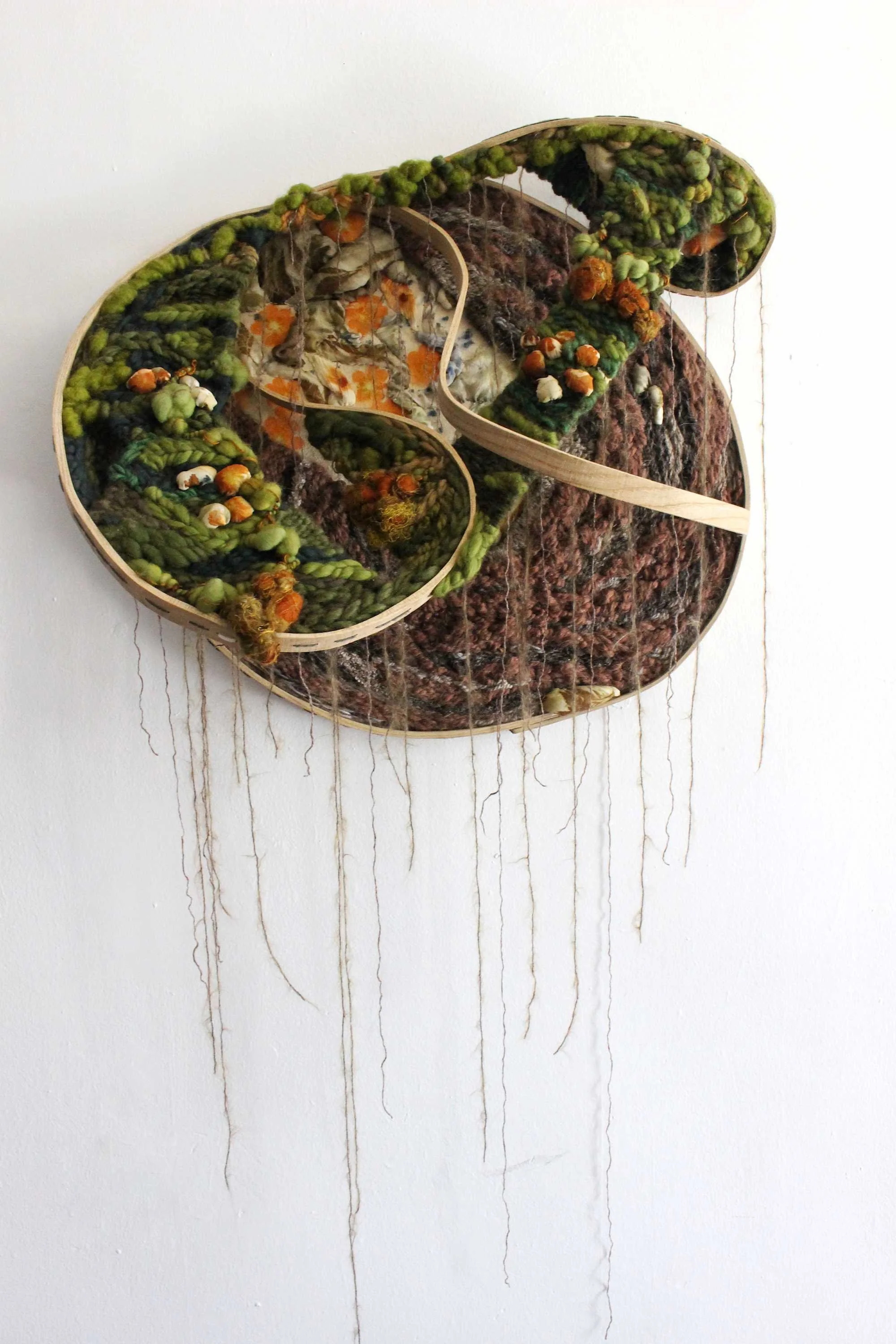 "Interdependence," 22 x 28 x 9.5 inches, Hand-bent wood frame, eco-printed fabric, wool, silk, cotton, acrylic, 2025