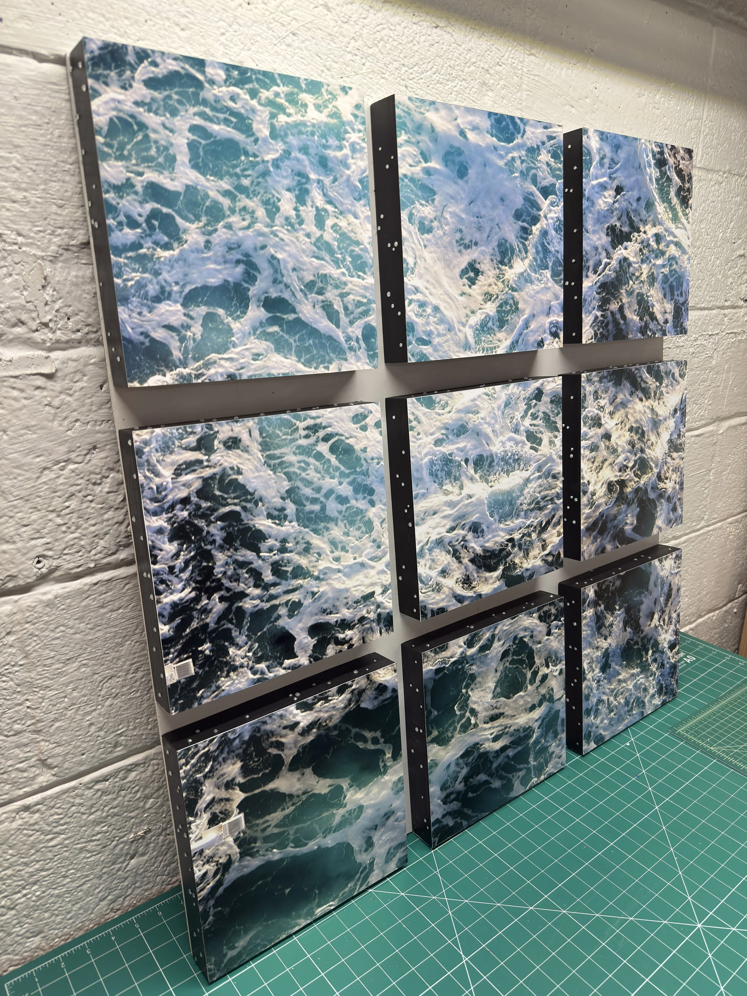 Carl Patow, "Current Turbulence", Photographic grid with rhinestone applique