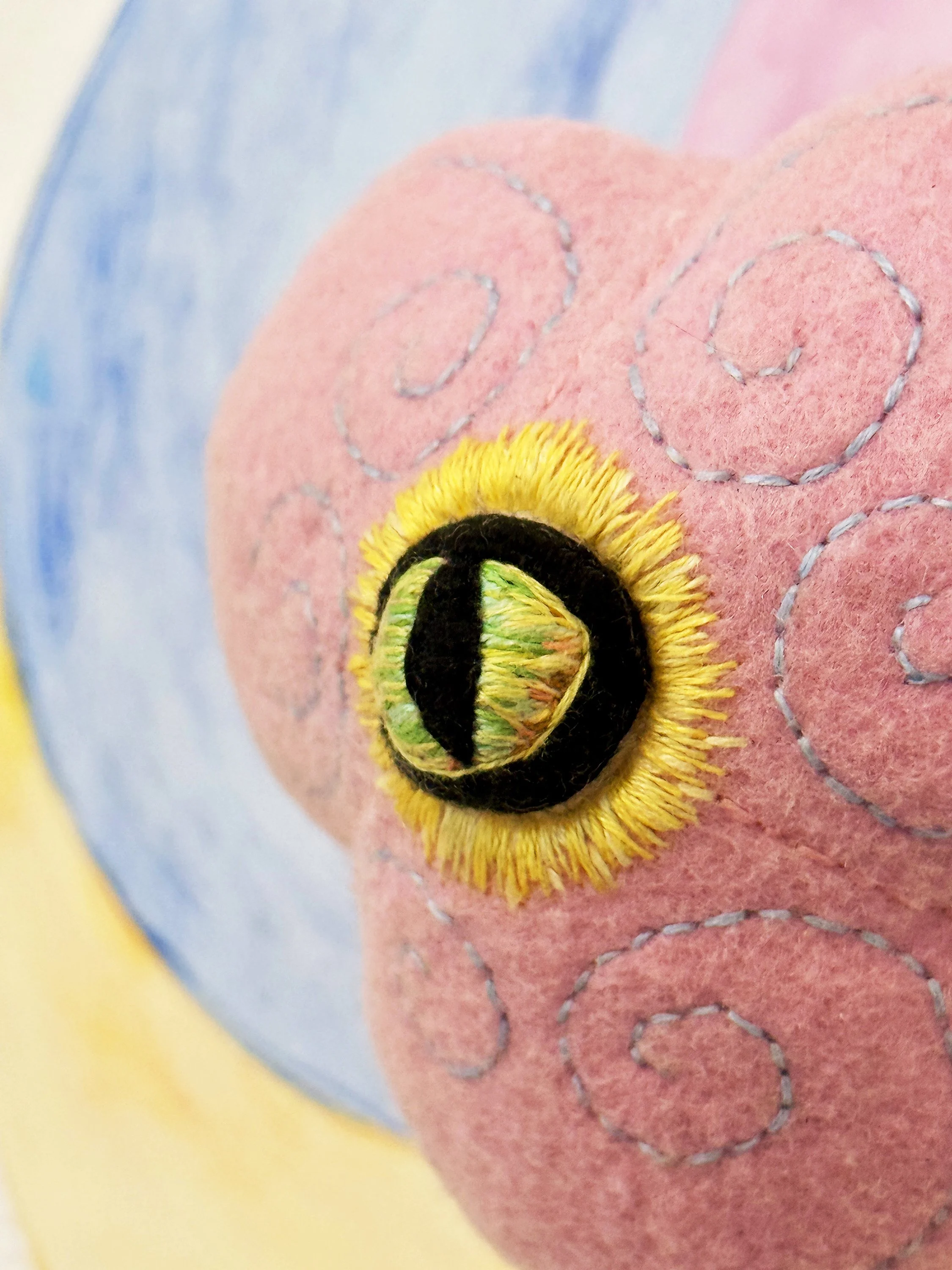 Heart Me Roar, (detail) Wet felted wool, embroidery, magnets, acrylic paint, wood, 2025