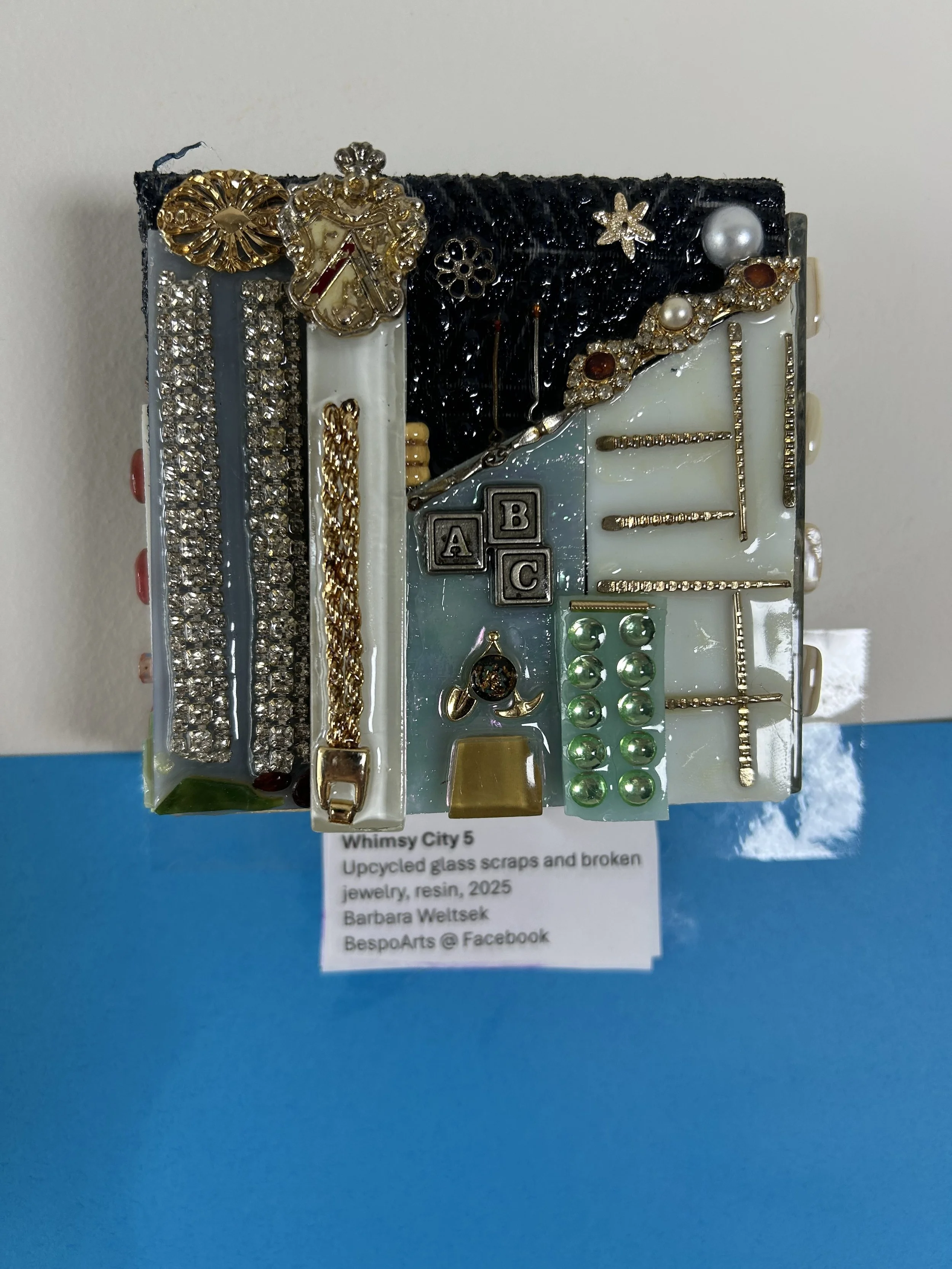 Whimsy City 5 /
Upcycled glass scraps and broken jewelry, resin, 2025