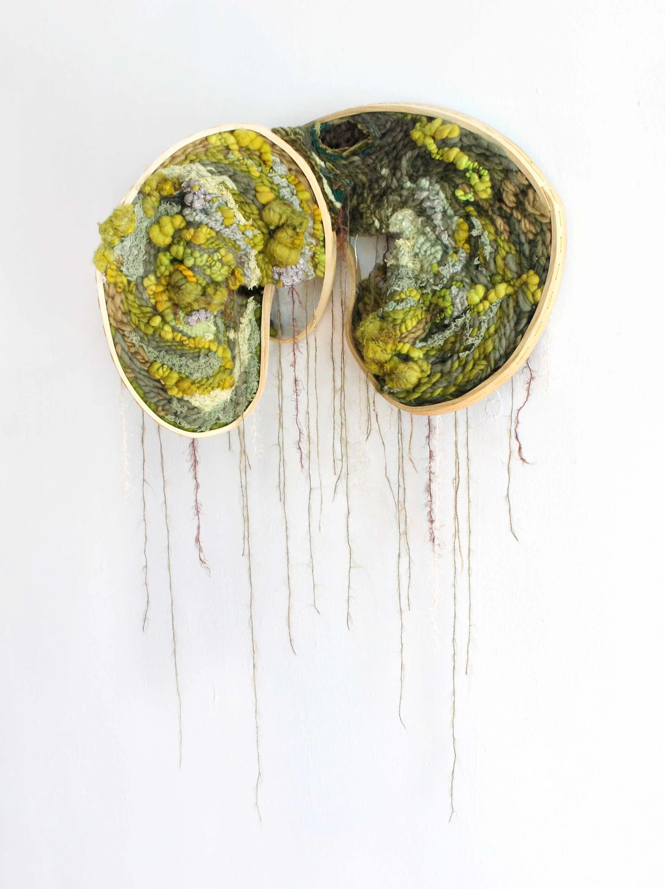 "Interconectedness," 19 x 23 x 10.5 inches,  
Hand-bent wood frame, wool, cotton, acrylic, sequins, 2025
