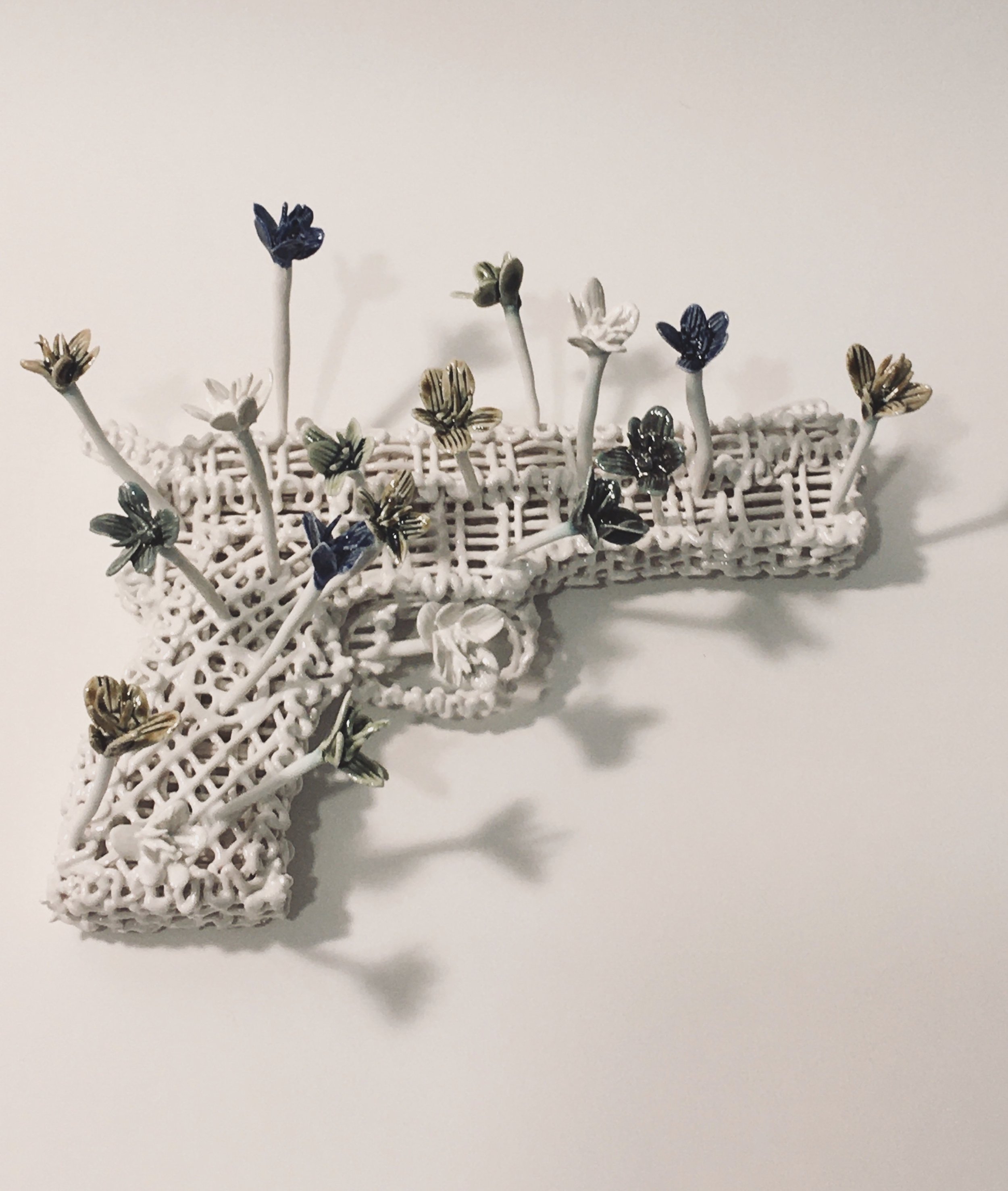 Blooms; 2021; glazed porcelain; 4 x 7 x 4 inches