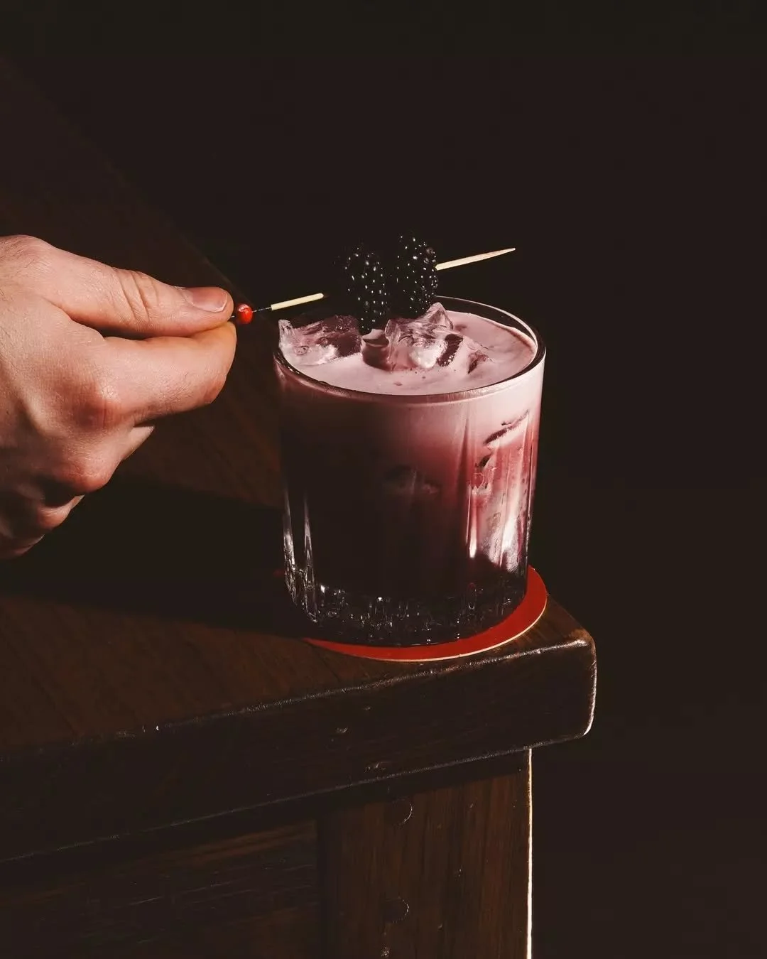 Blackberry Garden. Gin, blackcurrant liqueur, muddled blackberries, mint, lemon. Sweet, sharp, gone before you know it. Summer afternoon sipping at it's finest.