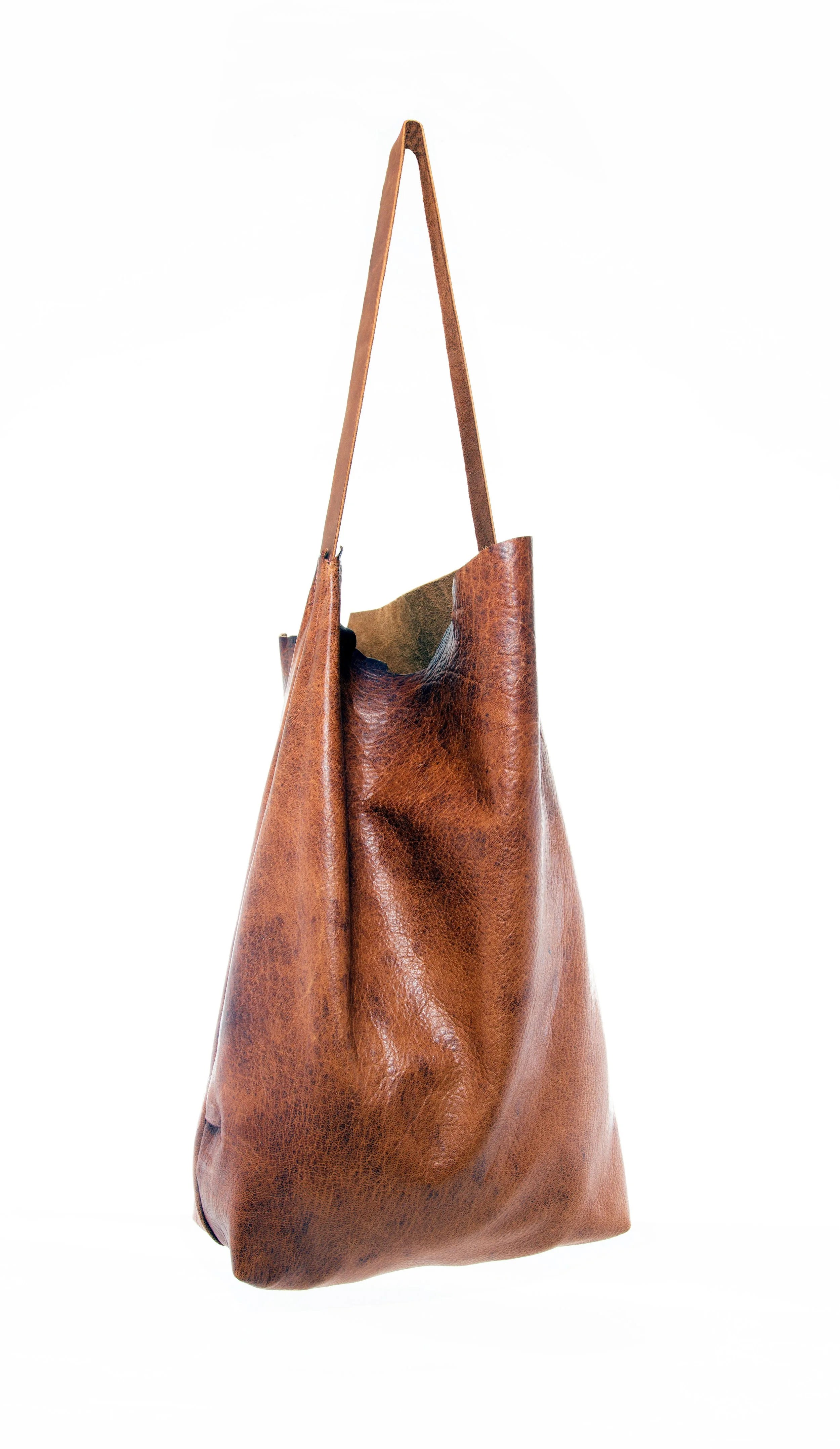 b. Oversized raw leather tote front view .jpg