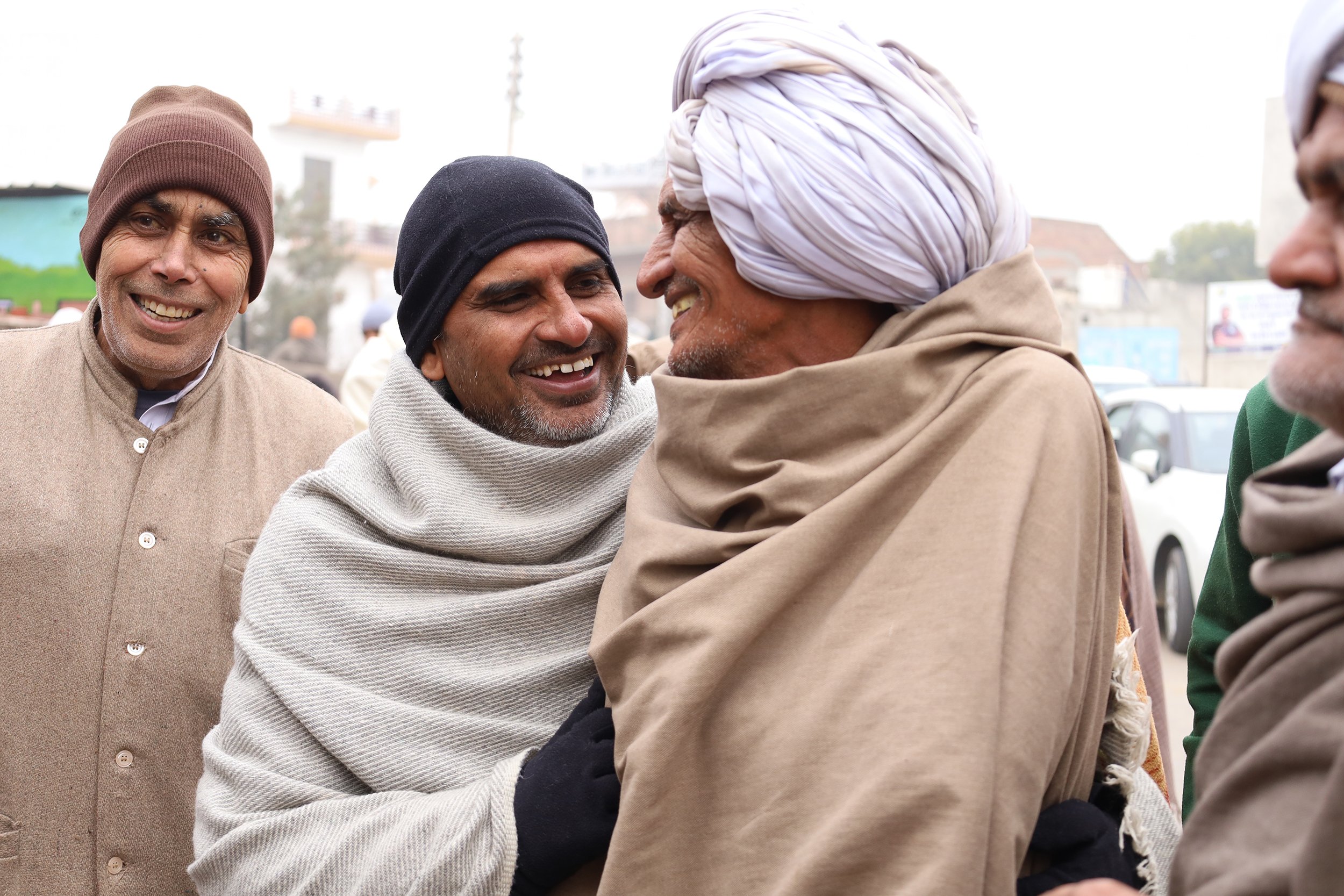  Jassi jokes with friends on a farmers’ union election morning in Harsola. Jassi spent much of his morning talking to men before they voted, putting in a final good word for his uncle, Hukmi Dhull, who ran and won. “The best moments for me have been 