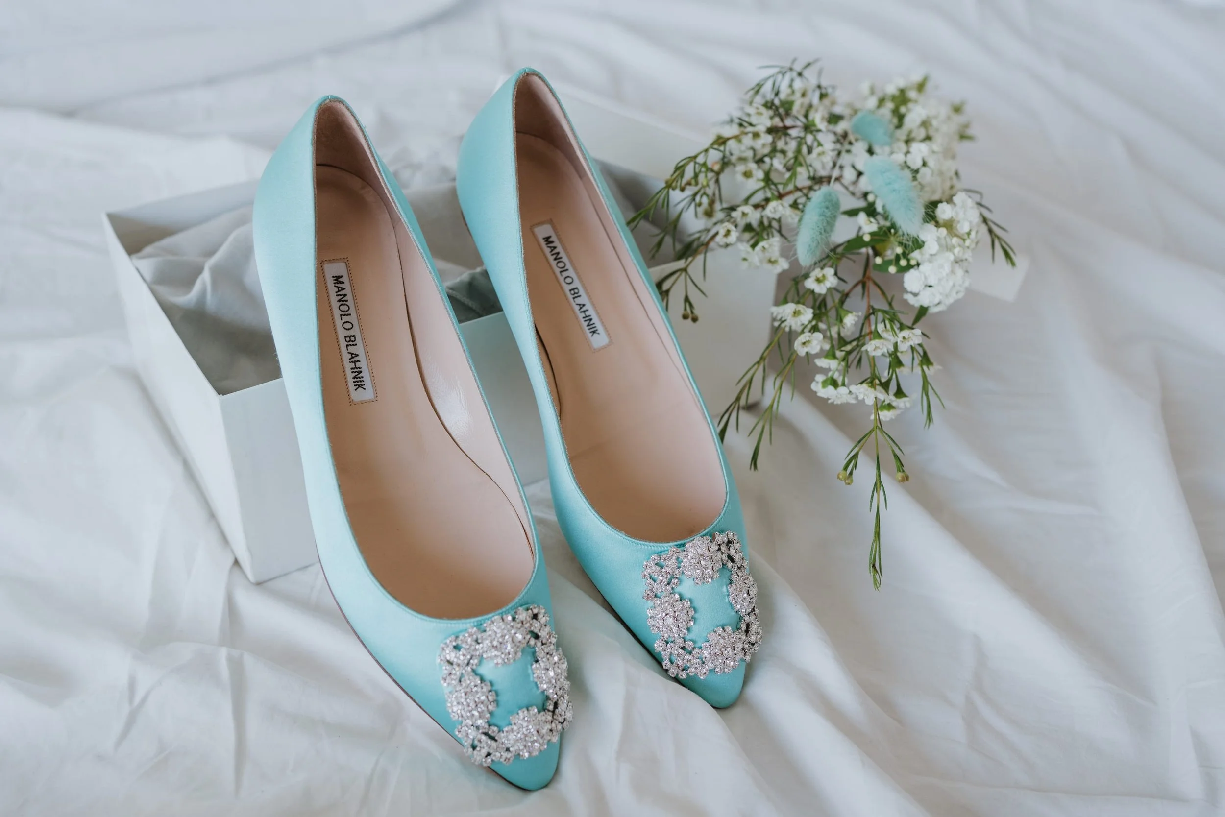 turquoise shoes at pre-loved store