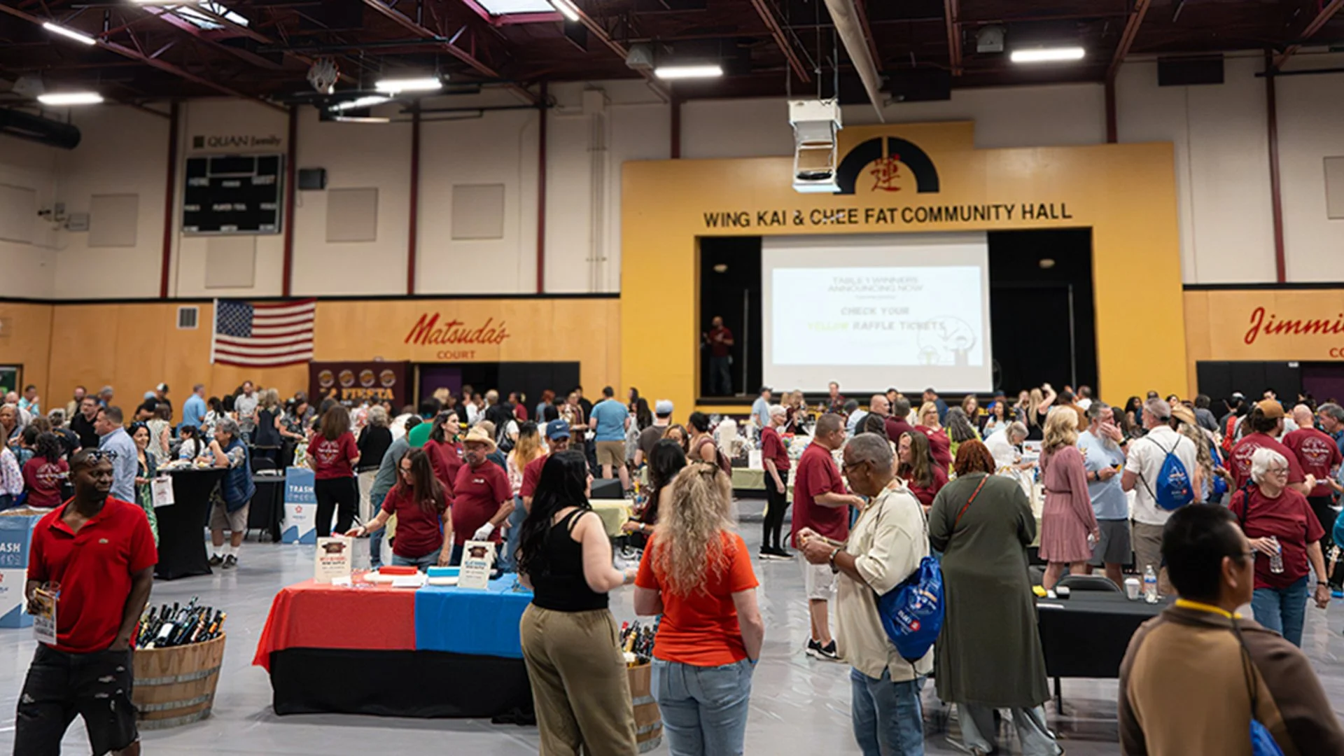 Wide view of attendees gathering and visiting vendor booths at the Taste of Elk Grove community event in Elk Grove, California