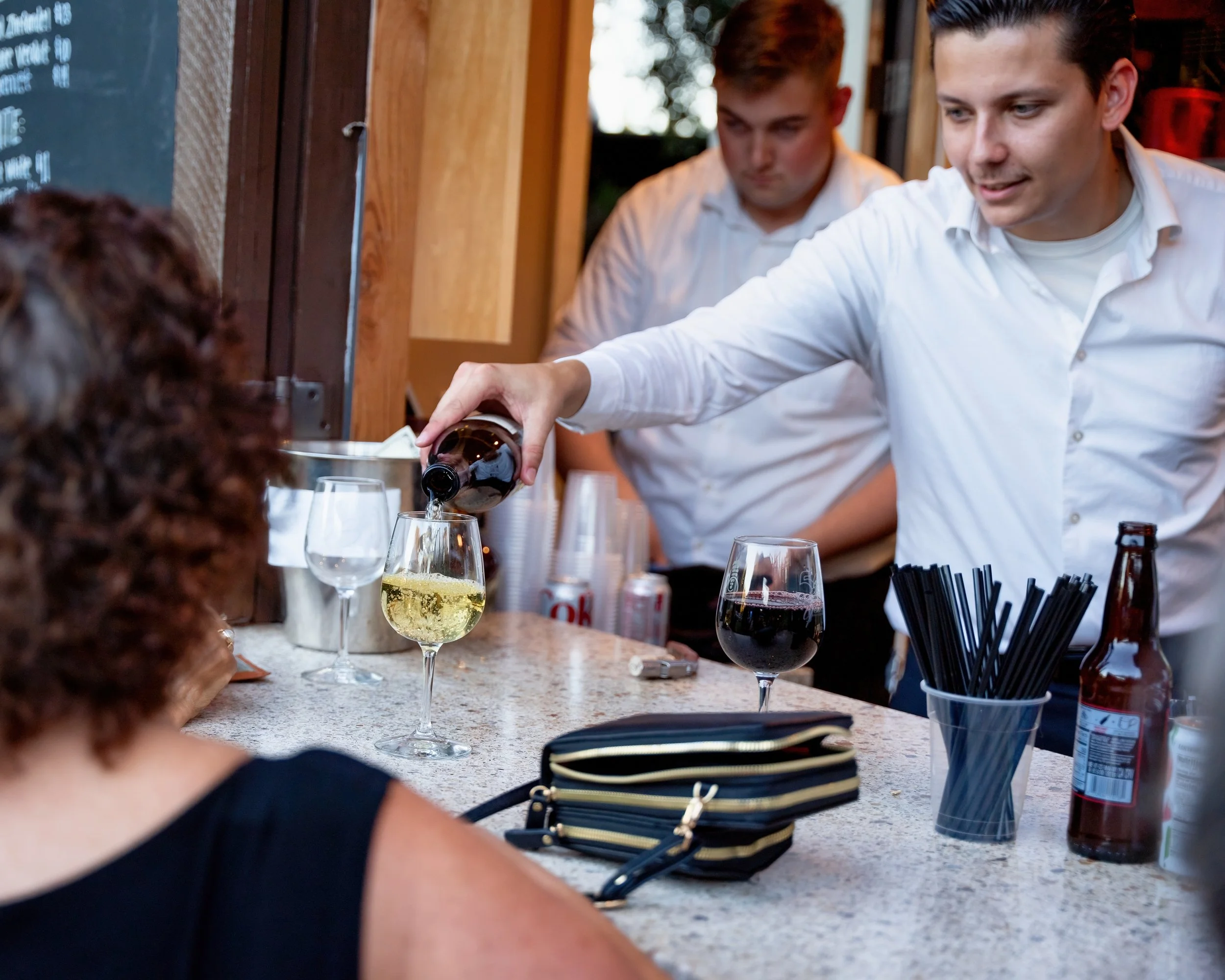 Corporate event photography of wine service at Elk Grove business event