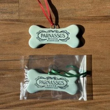 Parnassus ornaments shaped like dog bones available for sell in Parnassus Books in Nashville. Made at Old School Farm Pottery, a nonprofit Nashville Pottery