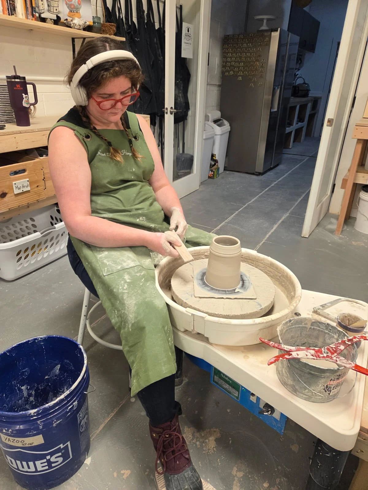 Sarah throwing this year's mug form on a wheel at Old School Farm Pottery, a nonprofit Nashville Pottery