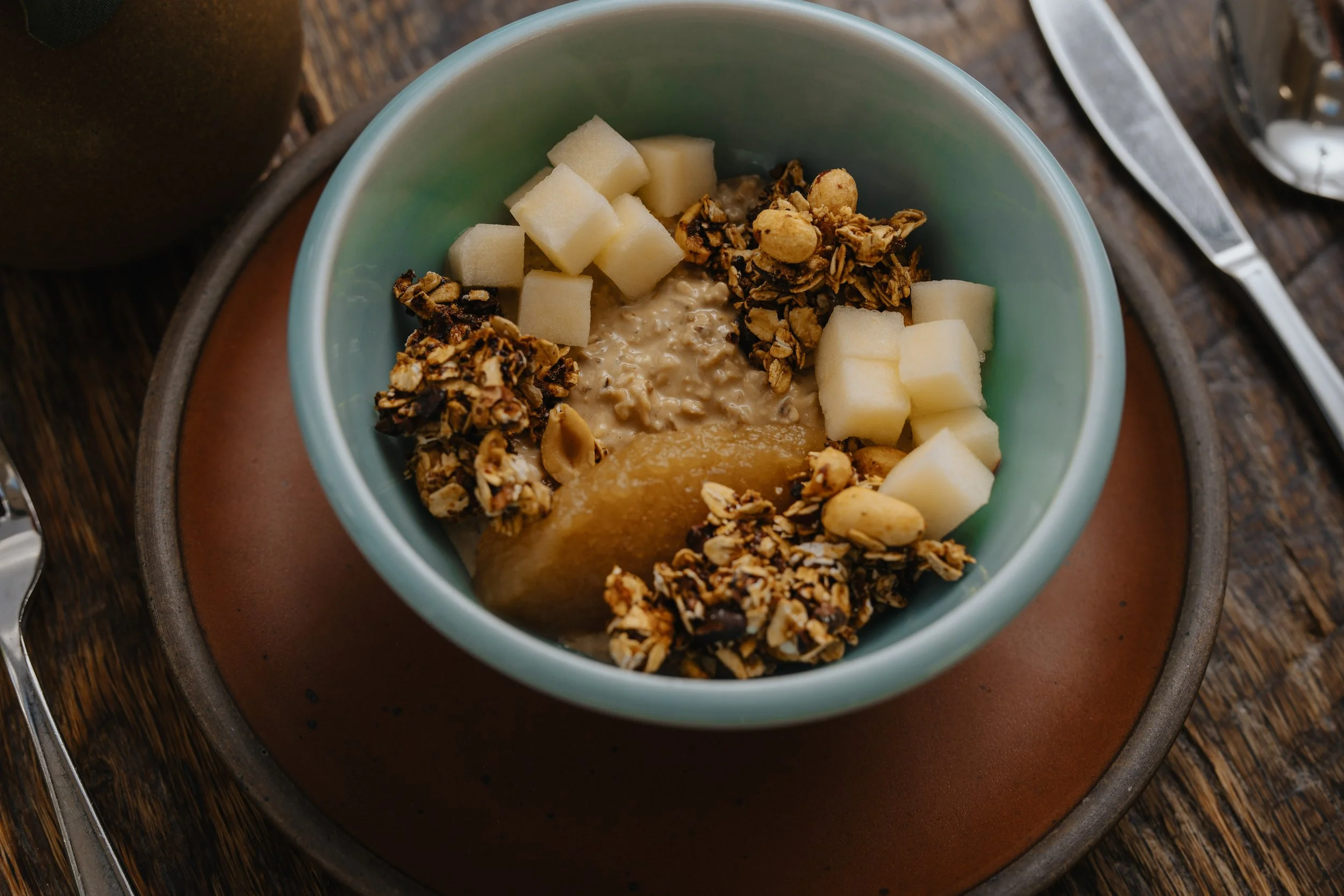 A dessert in a blue porcelain bowl. Bowl made at Old School Farm Pottery, a nonprofit Nashville Pottery