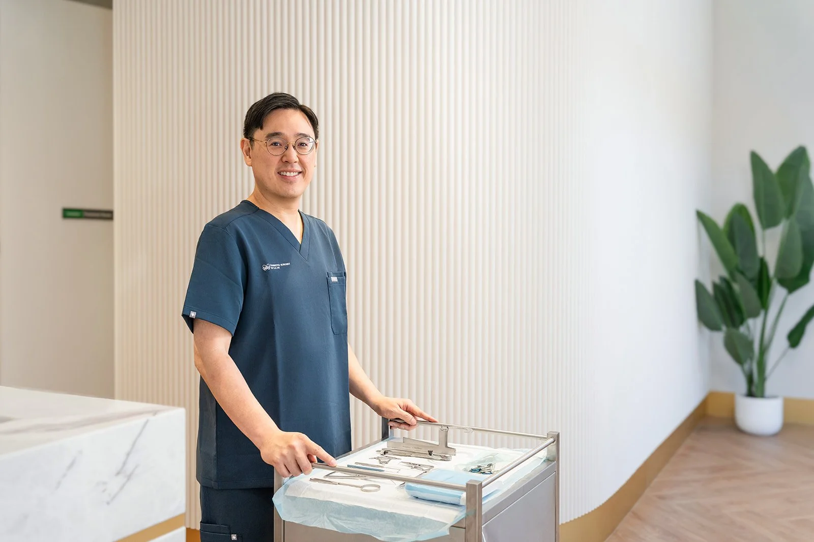 Cosmetic surgeon scrubs portrait consulting room Melbourne medical photography