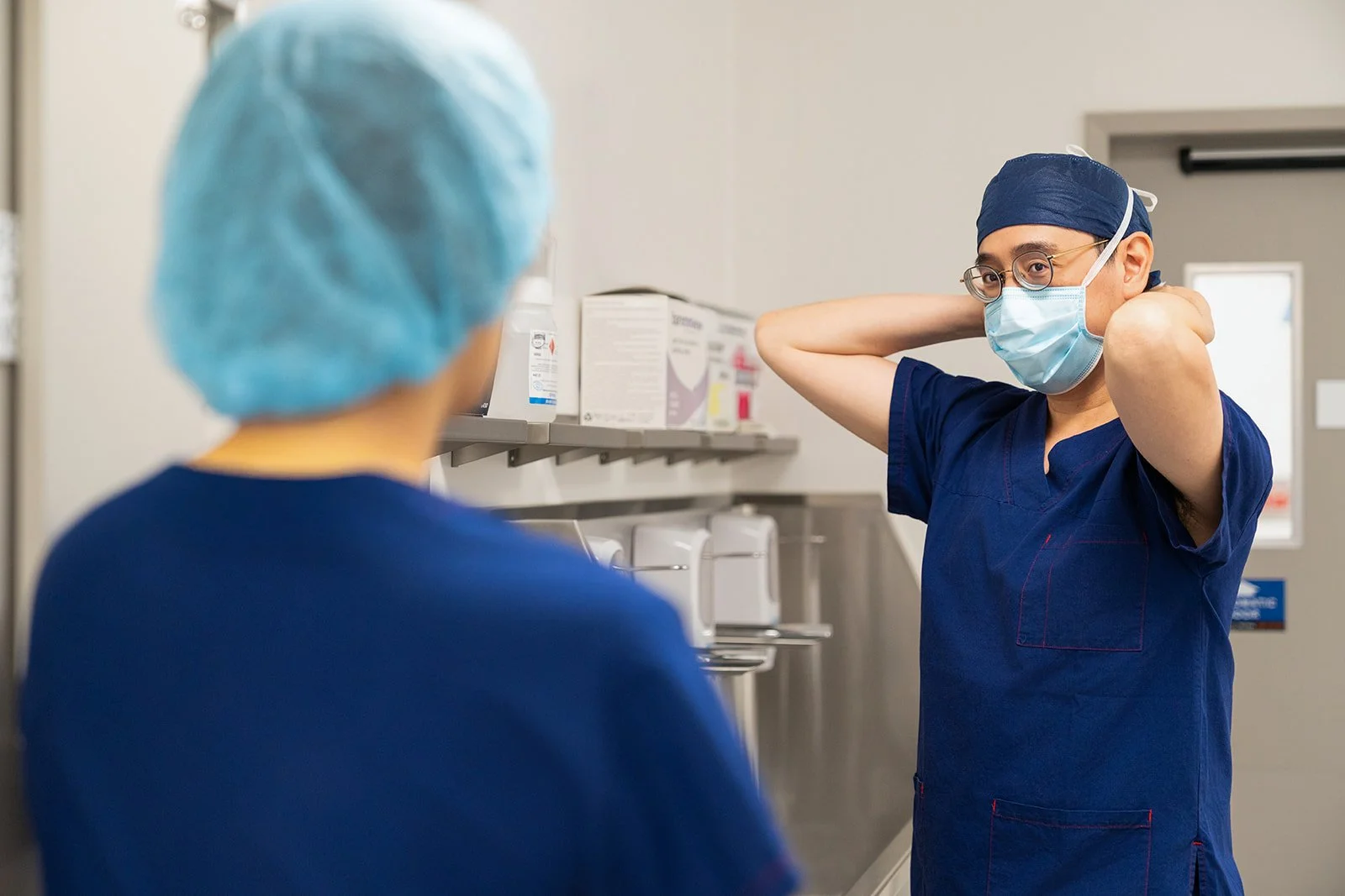 Cosmetic surgeon surgical preparation scrubbing Melbourne hospital photography