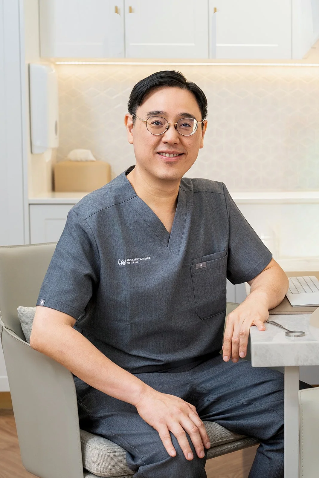 Cosmetic surgeon desk portrait consultation Melbourne professional photography