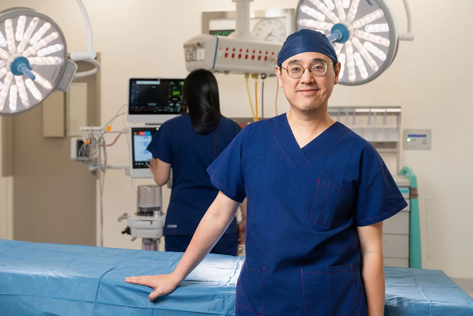 Cosmetic surgeon operating theatre team portrait Melbourne hospital photography