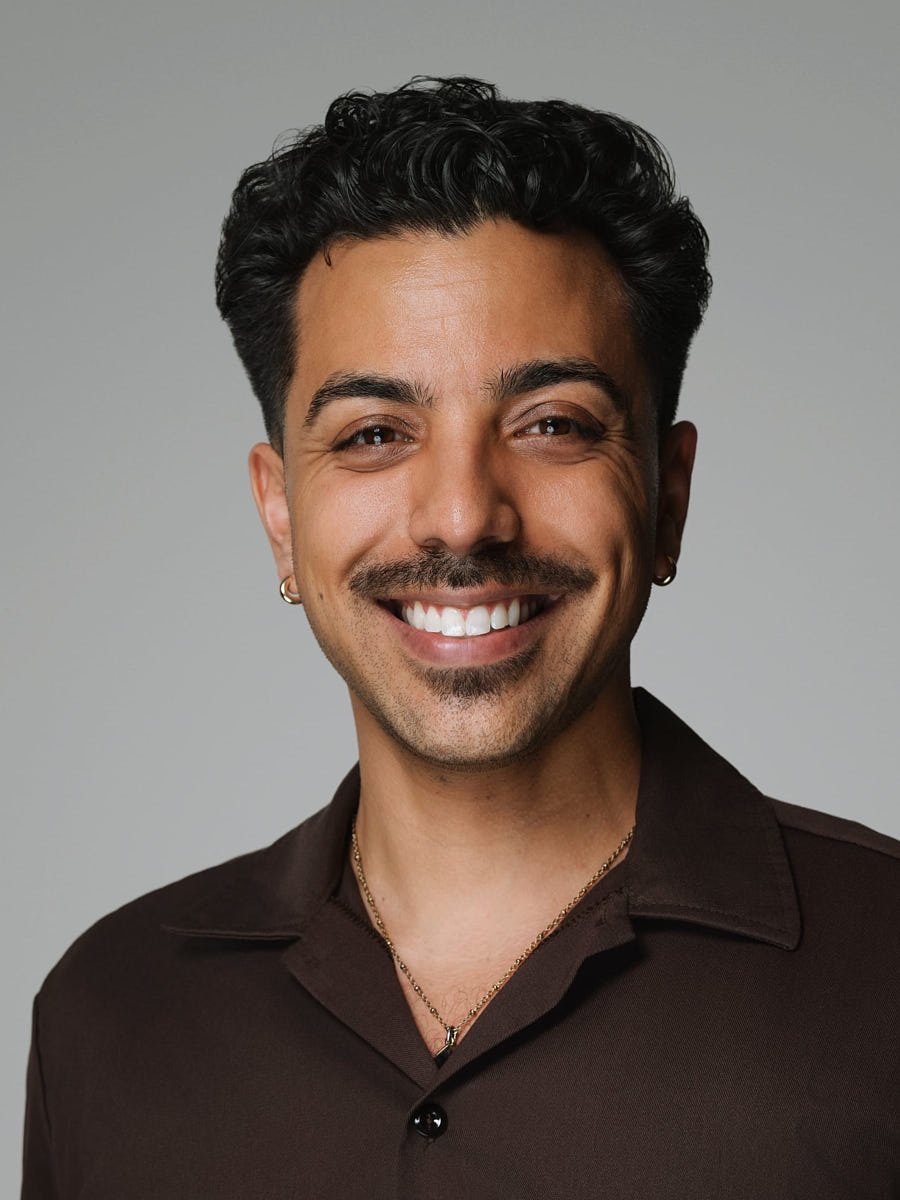 corporate-headshot-nyc-man-brown-shirt-gray-background.jpg