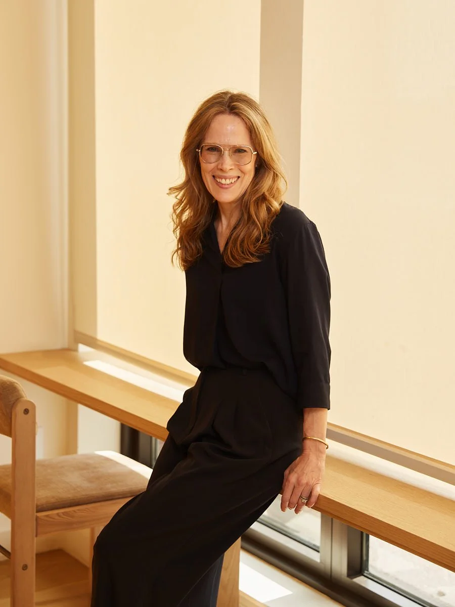 personal-branding-photography-nyc-woman-black-outfit-seated-by-window.jpg