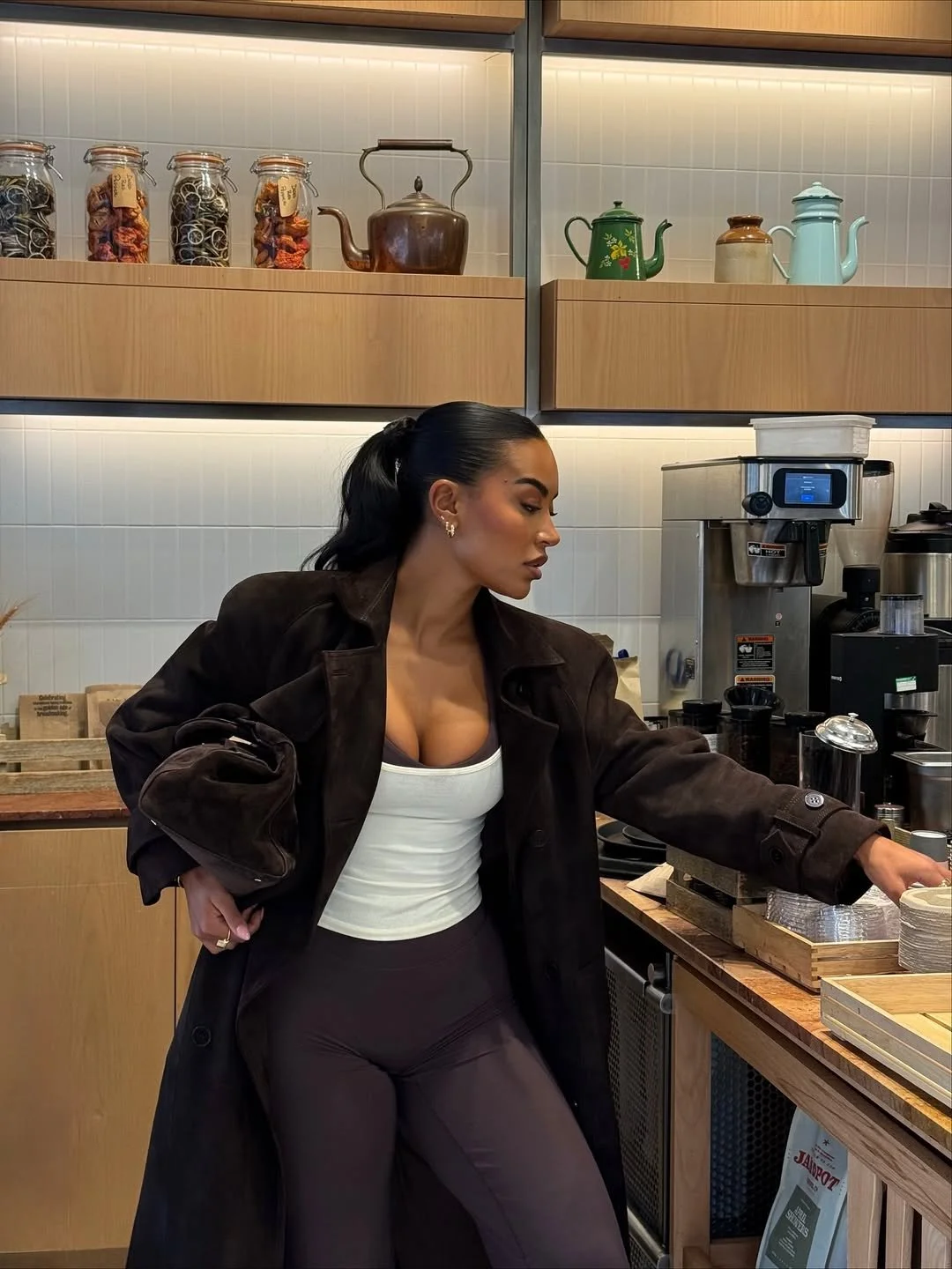 Olivia Sullivan Davis modelling Oner Active gymwear for influencer campaign in London coffee shop