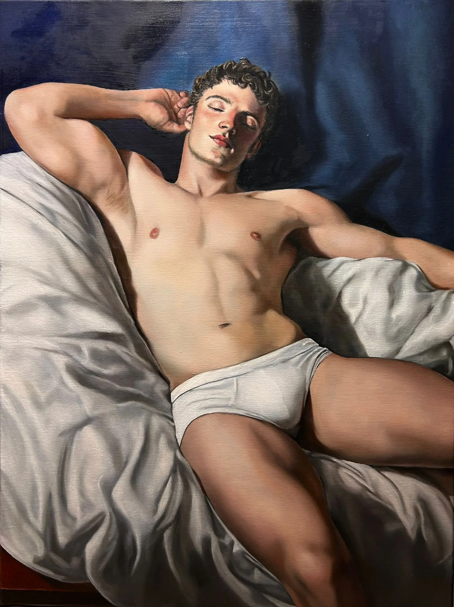 “Hypnos in Blue” is an original oil painting by Alexander Weaver that reimagines the Greek god Hypnos, the personification of sleep, through a contemporary figurative lens.